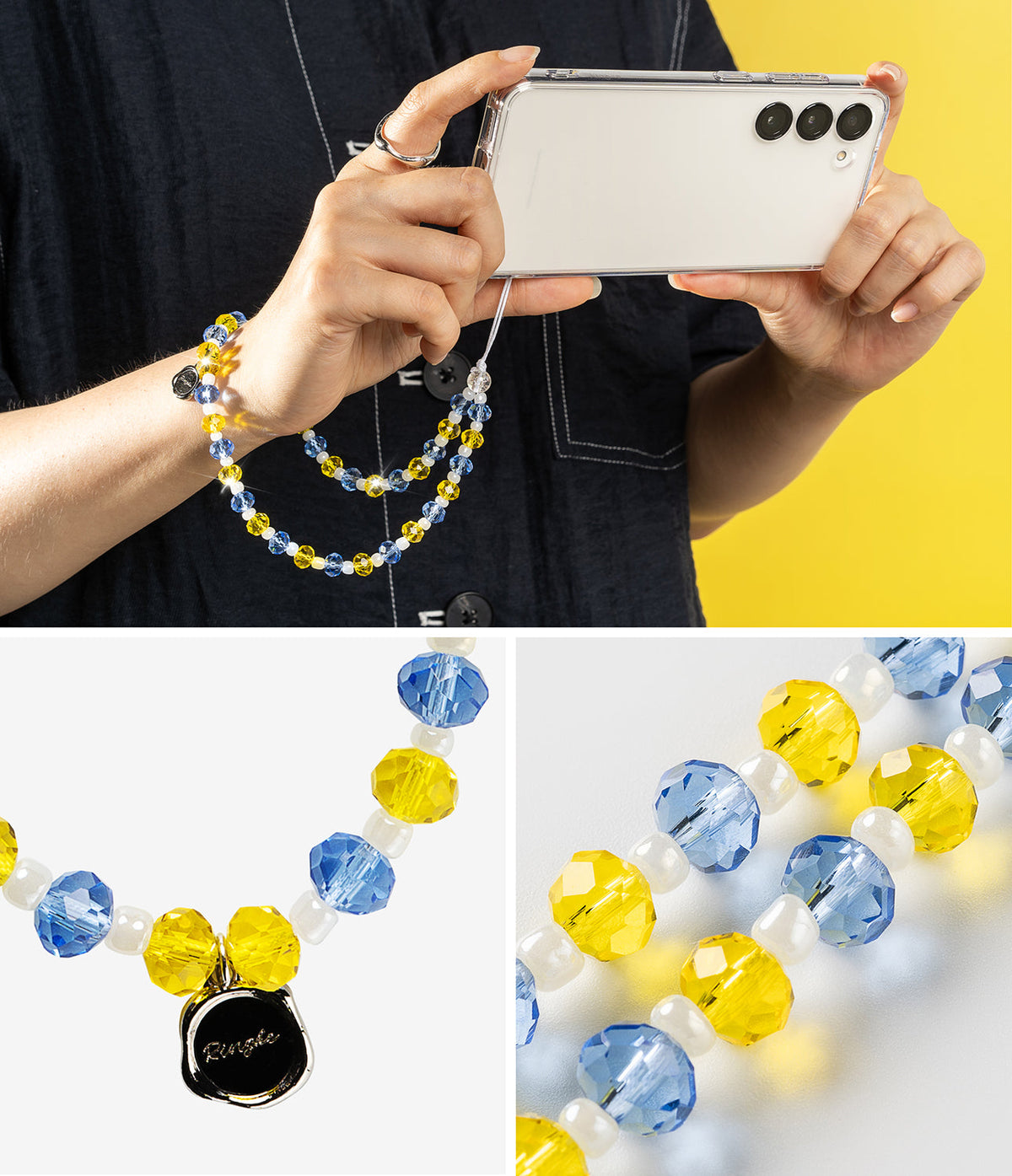 Beaded Strap - A person holding a phone with a blue and yellow beaded wrist strap featuring a black Ringle charm.