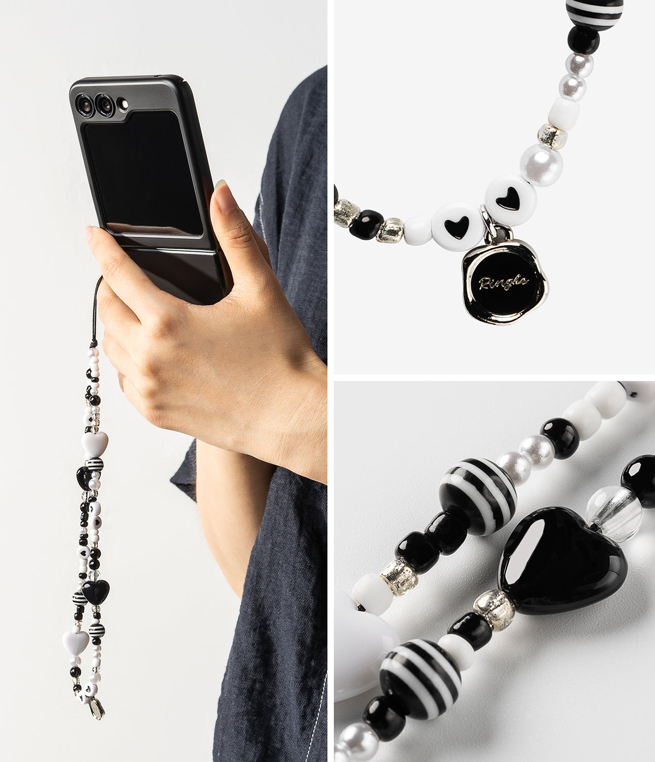 Beaded Strap - Hand holding a phone with a black and white beaded strap featuring heart, striped, and logo charms.