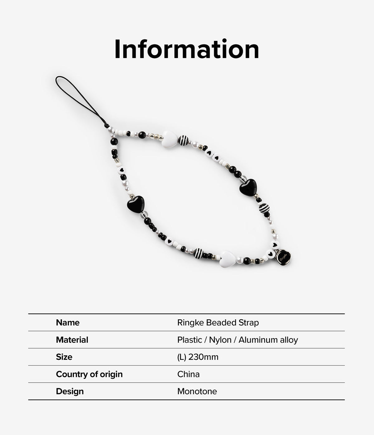 Beaded Strap - A black and white phone strap featuring heart-shaped beads, striped patterns, and a small circular charm.