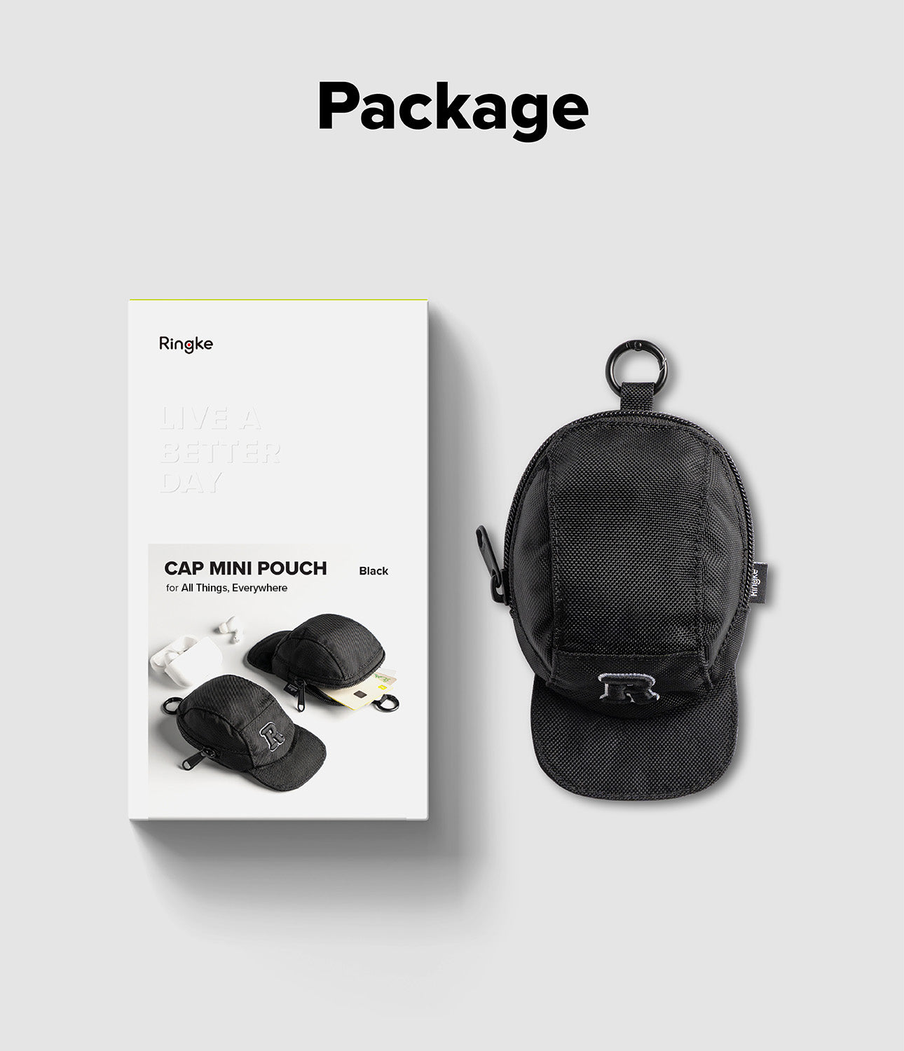 Mini Pouch | Cap - Black cap-shaped mini pouch with a carabiner next to its product packaging box.