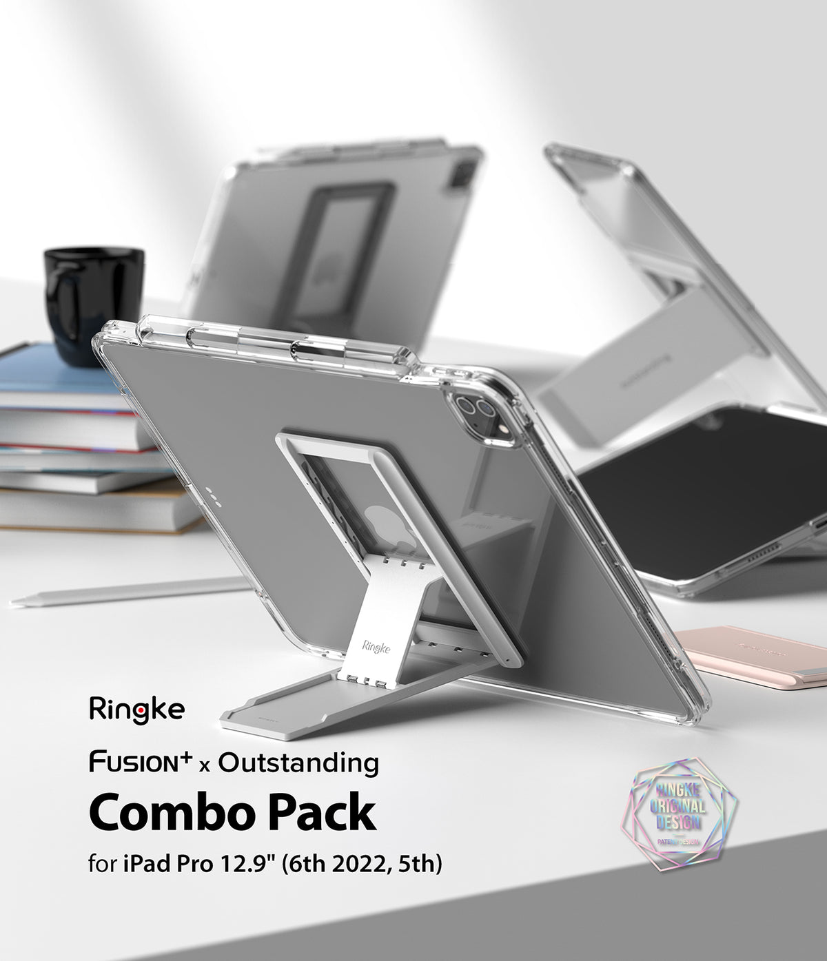 Fusion Plus + Outstanding | iPad - Clear iPad Pro case with a silver foldable kickstand on a white desk with books.