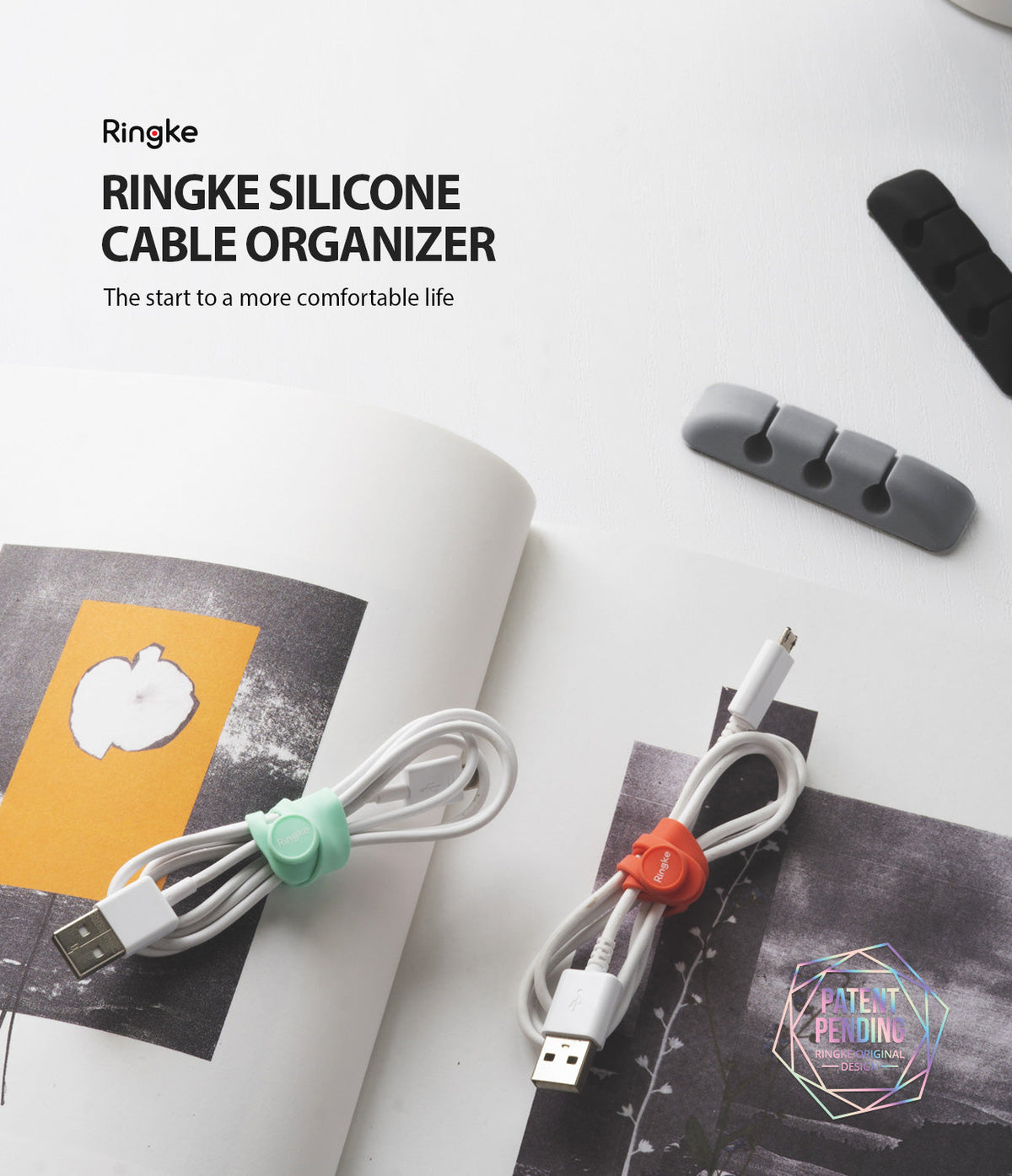 Silicone Cable Organizer - Colorful silicone cable ties securing white USB cables next to gray and black desk organizers.