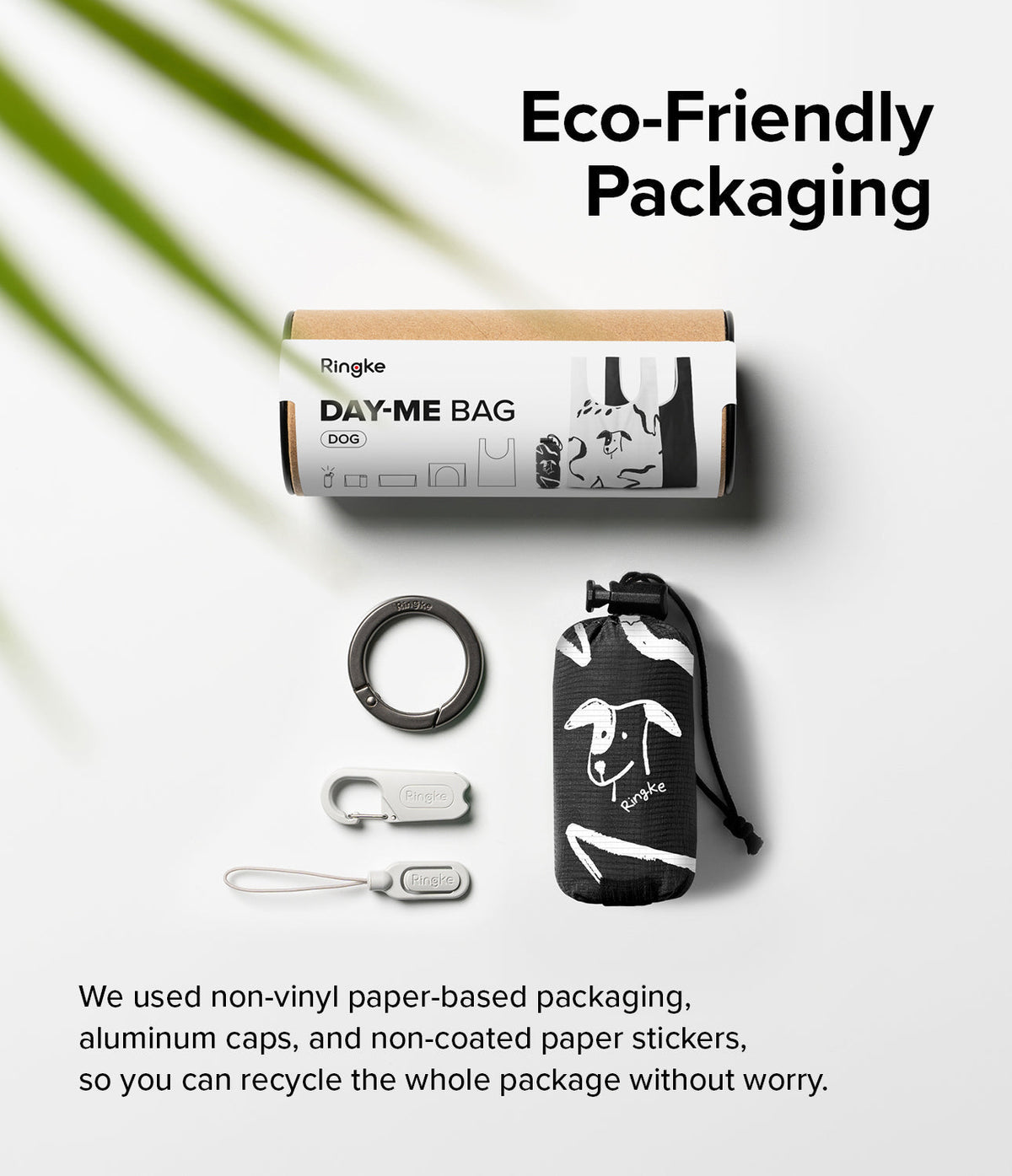Day-Me Bag - Eco-friendly packaging, a dog-patterned foldable bag, a carabiner, and clips on a white background.