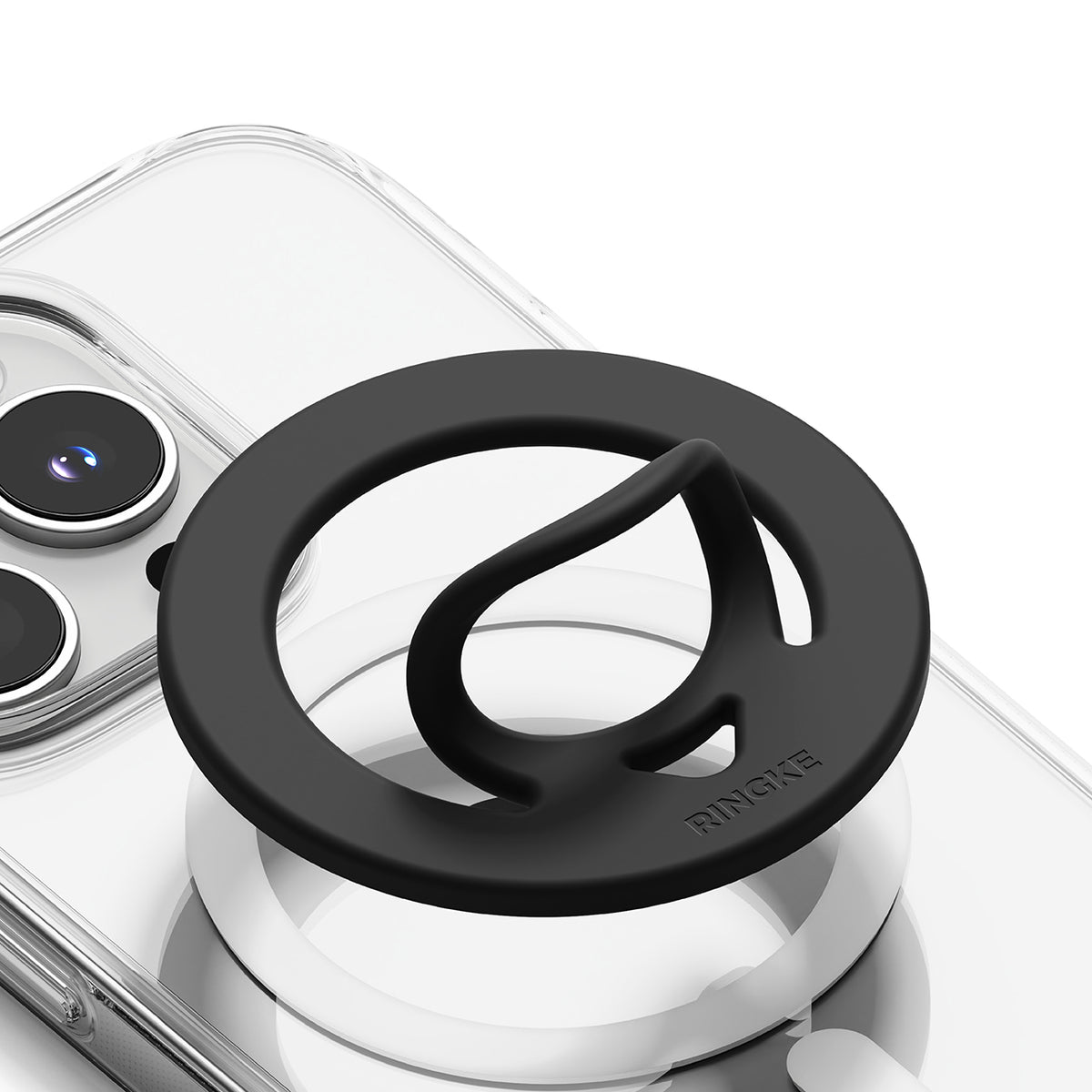Dual Magnetic Silicone Ring - Black silicone ring with a flexible finger loop attached to a clear phone case.