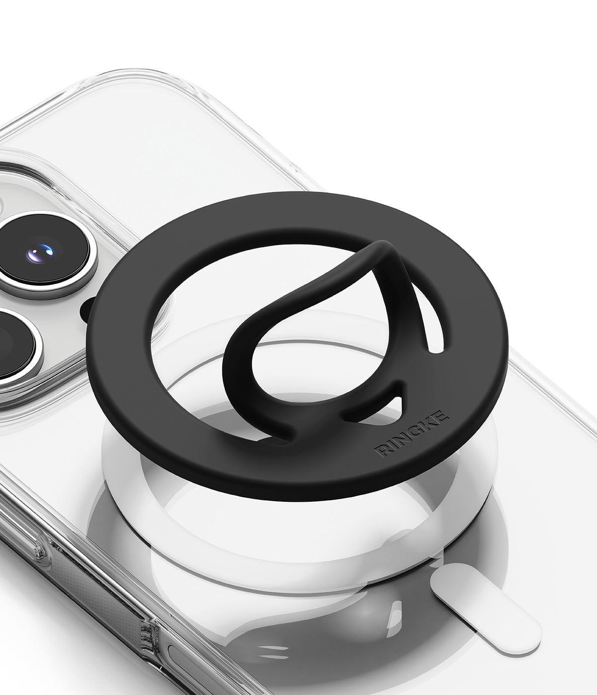 Dual Magnetic Silicone Ring - Black silicone ring with a flexible finger loop attached to a clear phone case.