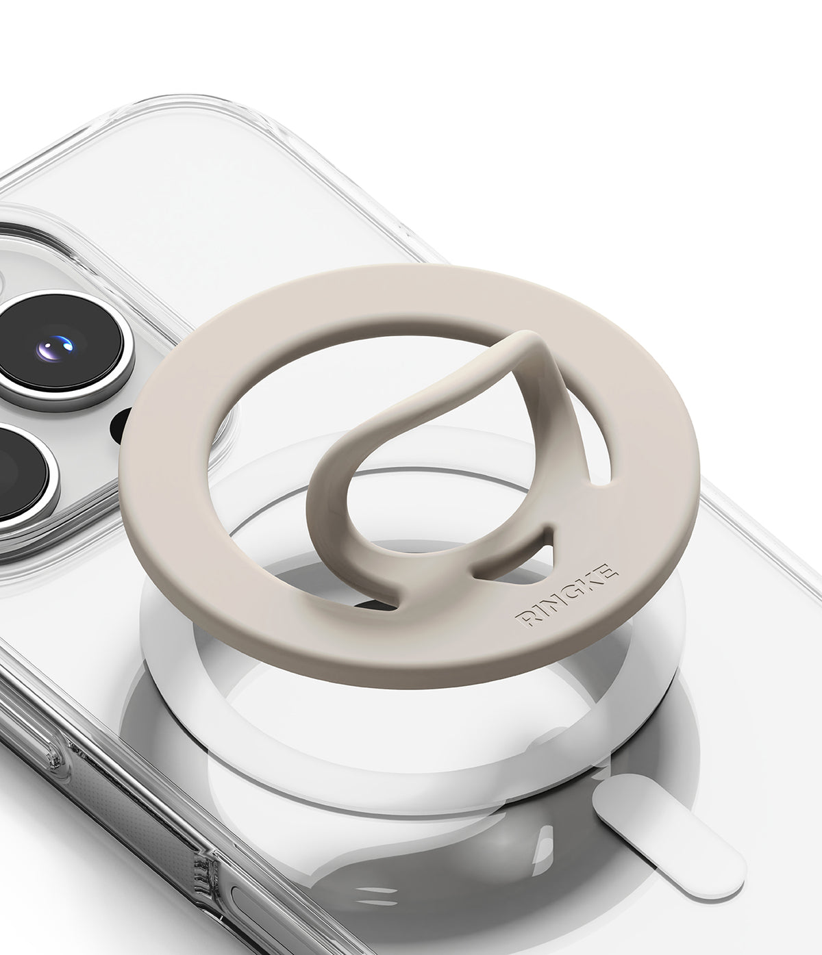 Dual Magnetic Silicone Ring - Beige silicone ring with a pop-out finger loop attached to a clear phone case.