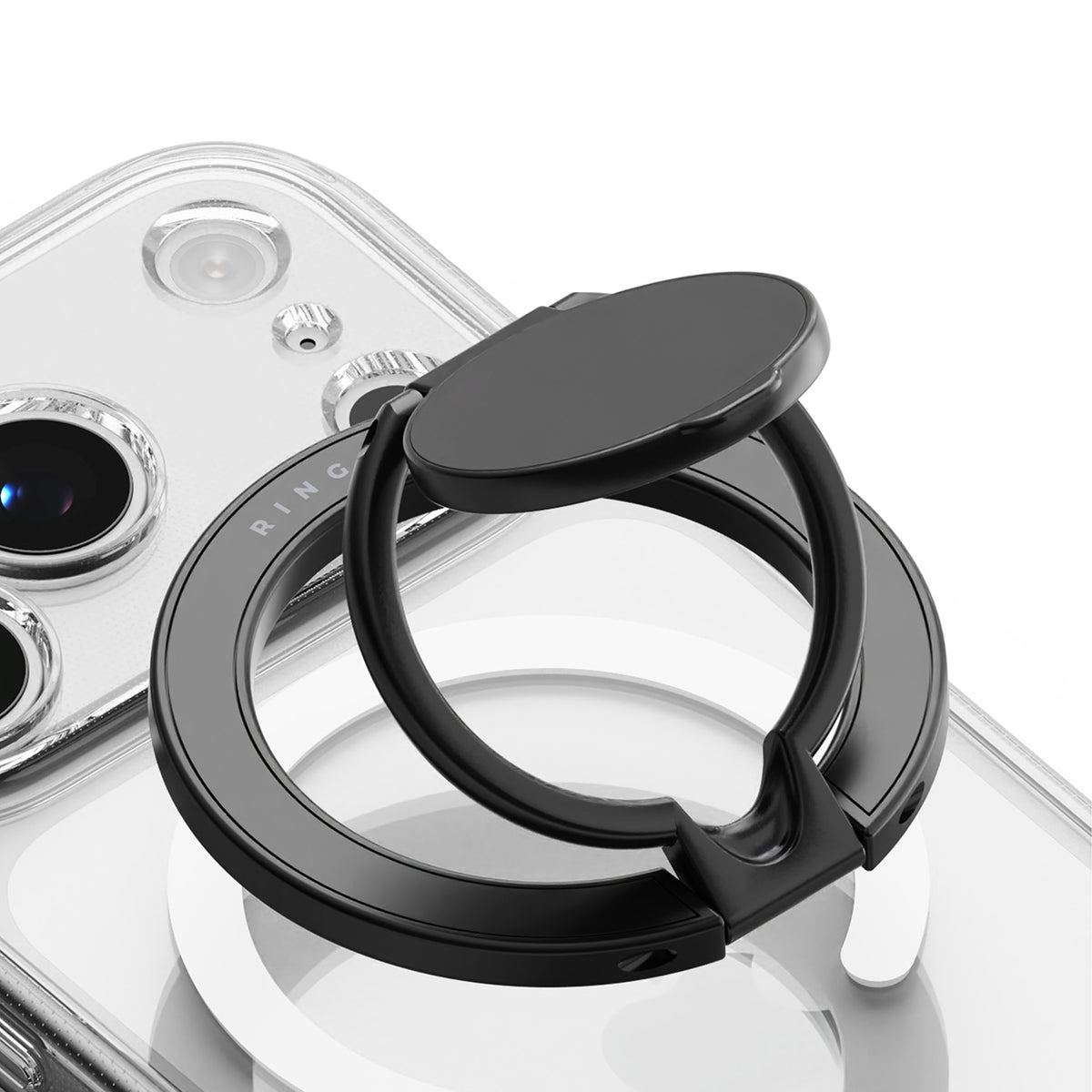 Dual Magnetic Smart Holder - A black magnetic ring holder attached to the back of a clear smartphone case.