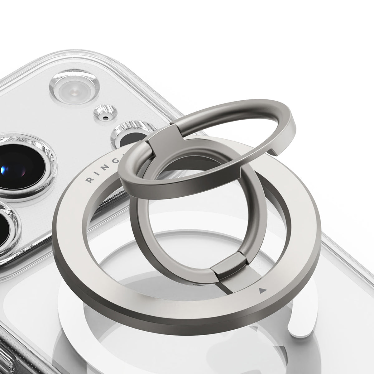 Dual Magnetic Smart Ring - A silver dual-ring magnetic phone grip attached to the back of a clear smartphone case.