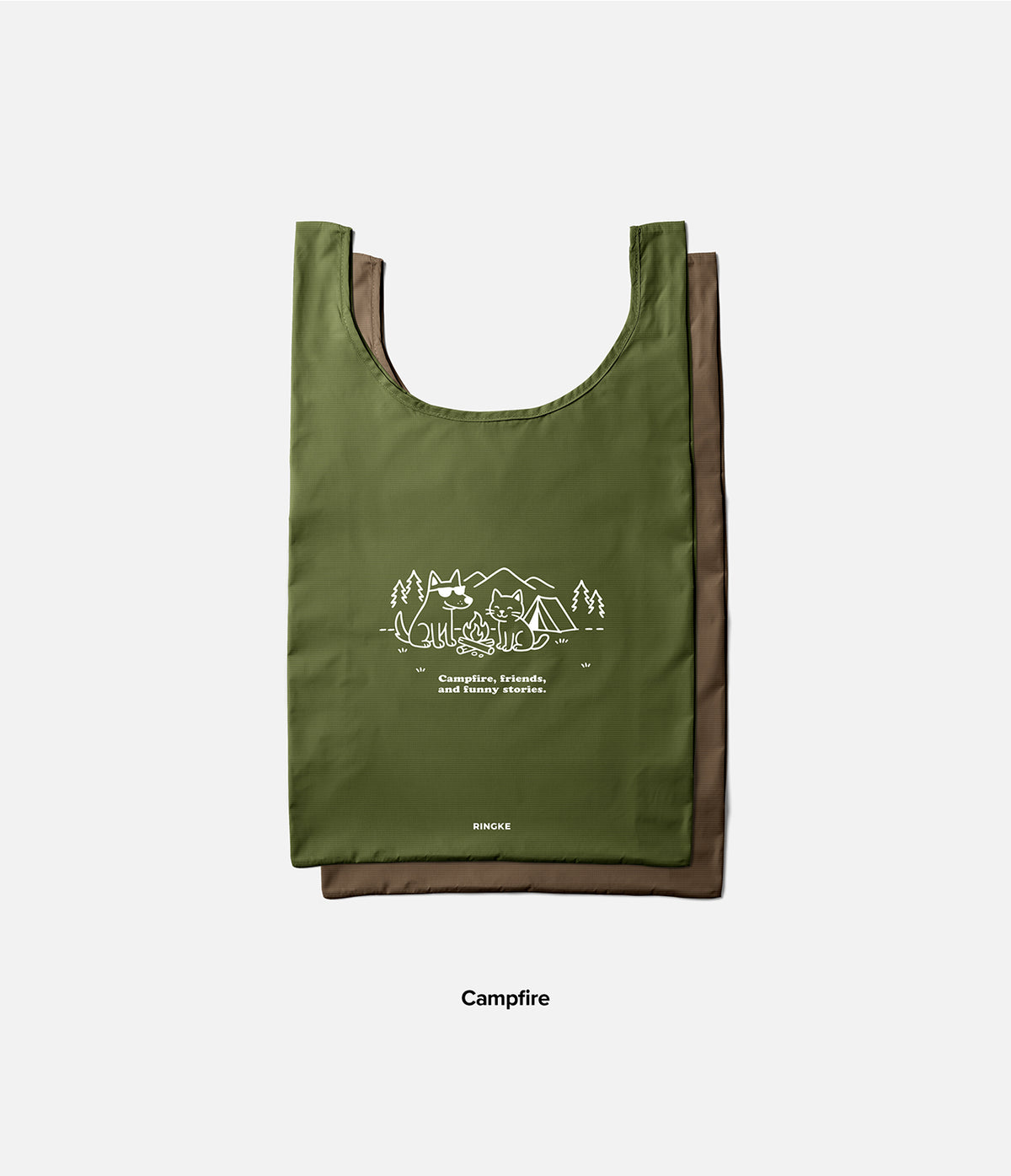 Day-Me Bag - Olive green tote with white line art of a dog and cat camping, text reads Campfire, friends, and funny stories.
