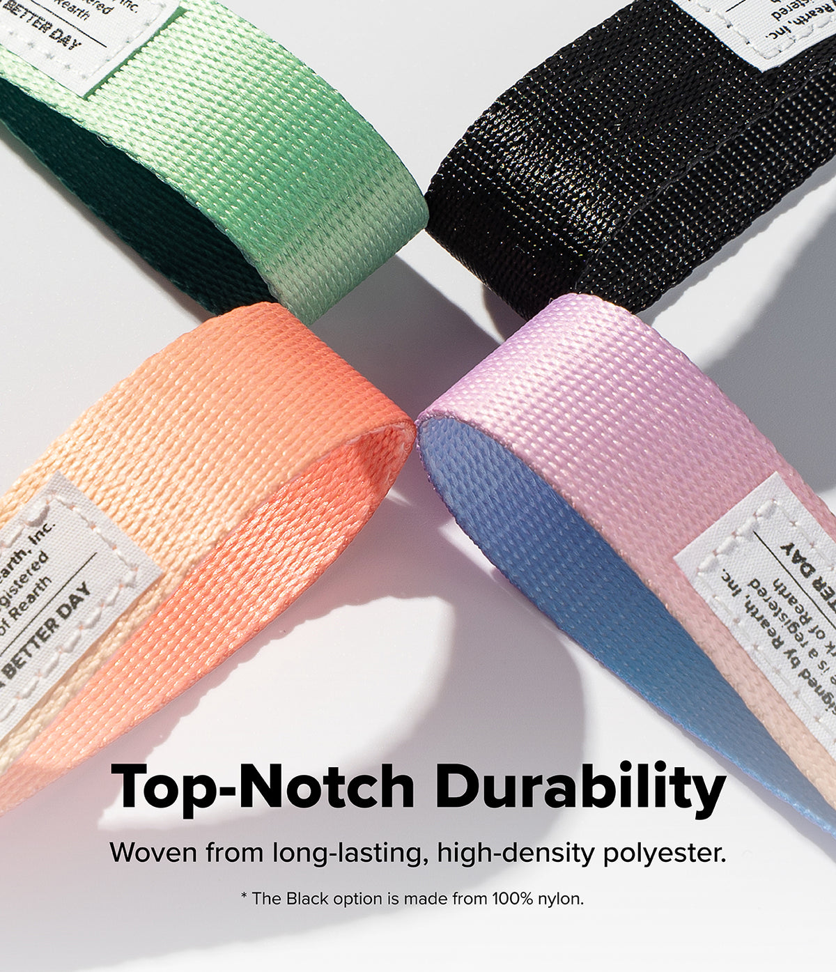 Holder Link Eyelet Keyring - Four colorful woven polyester fabric loops arranged in a cross pattern with branded white tags.