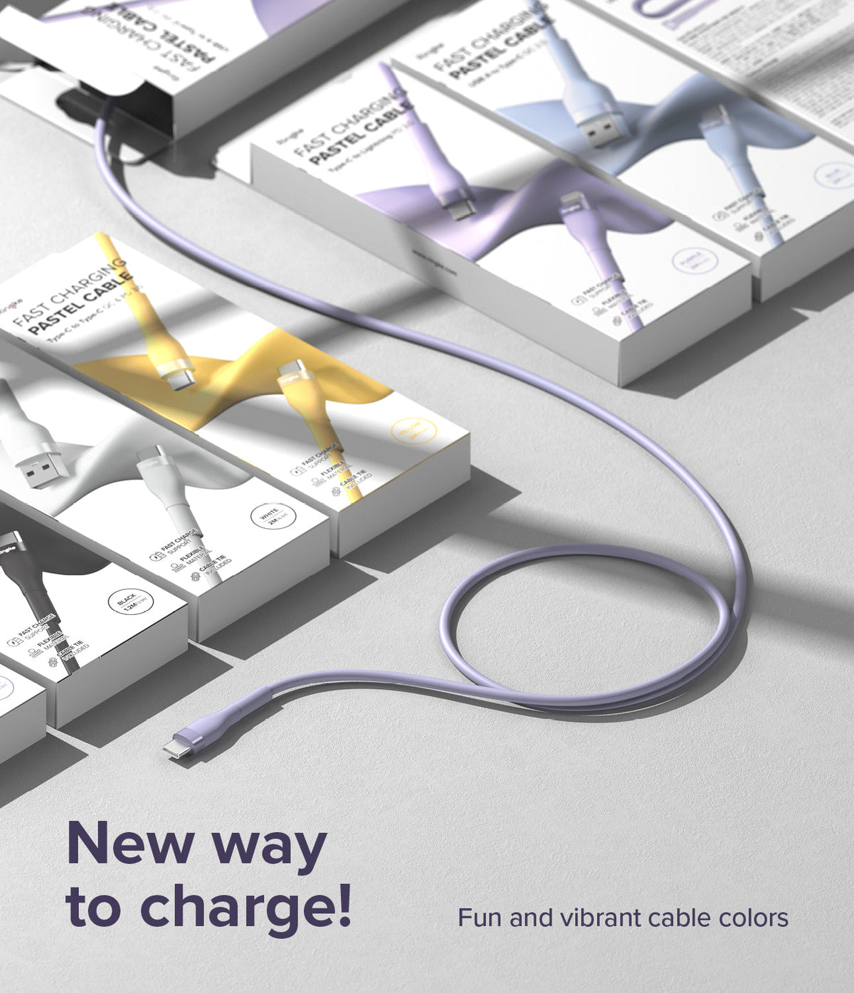 Ringke Fast Charging Pastel Cable - A Type-C Type - A purple charging cable coiled next to several pastel-colored boxes.