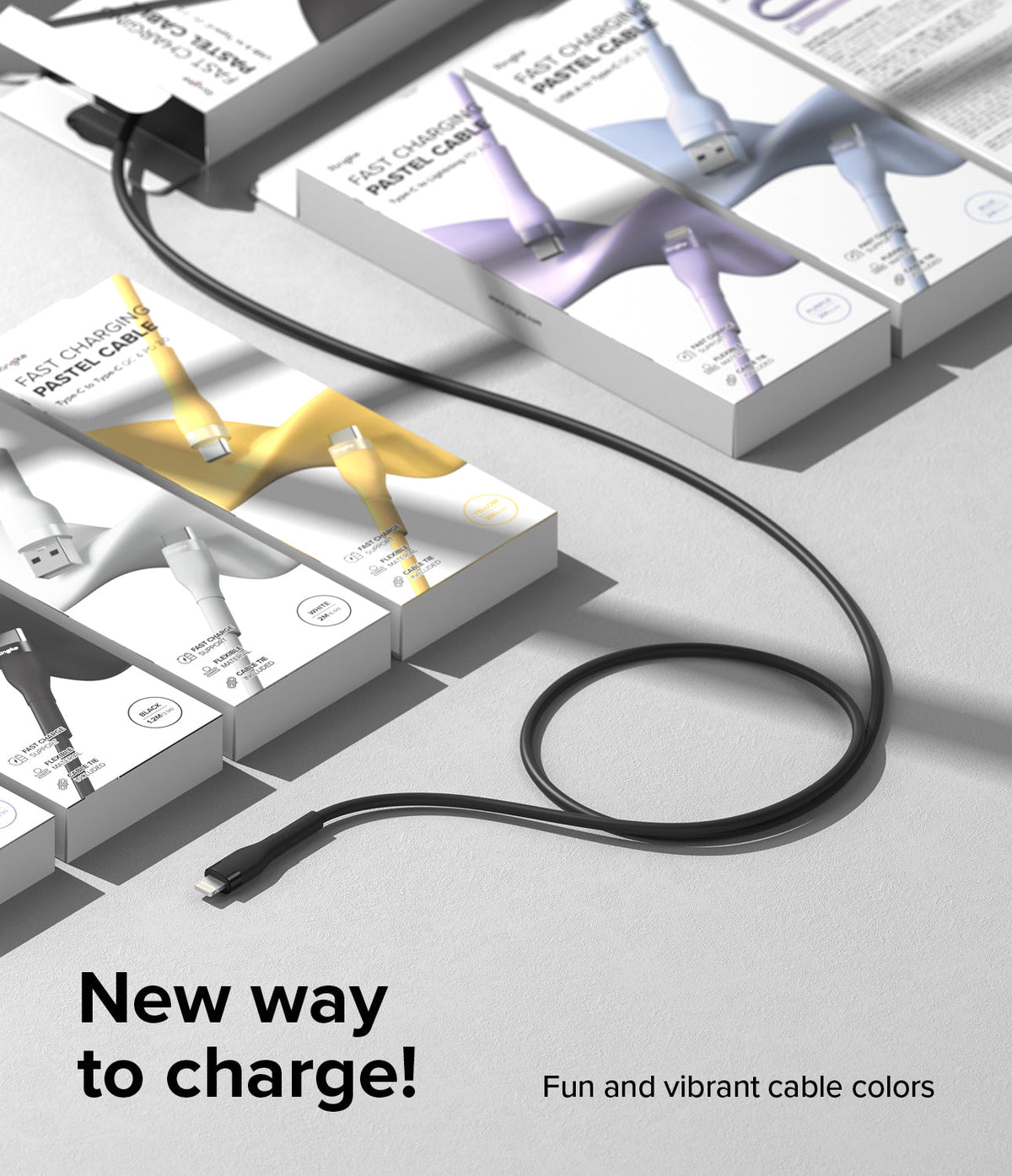 Ringke Fast Charging Pastel Cable - A Type-Lightning - A black charging cable coiled next to pastel-colored product boxes.