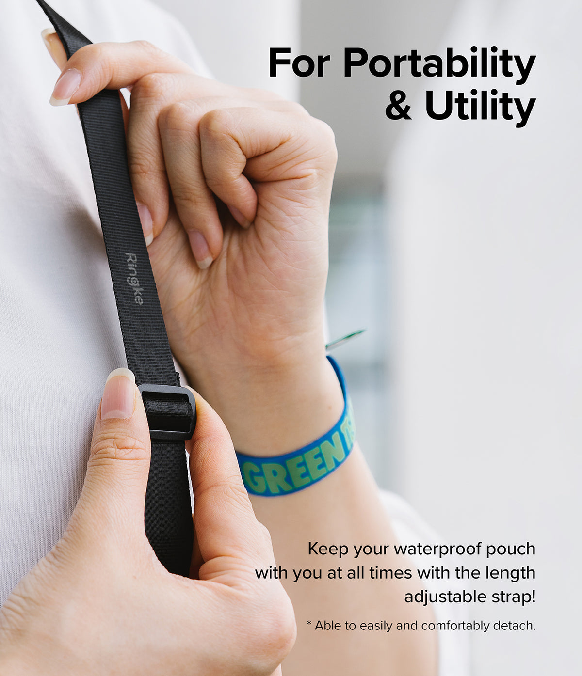 Waterproof Pouch Case | Floating - Waterproof Pouch Case - Hands adjusting the length of a black Ringke branded strap on a waterproof pouch.