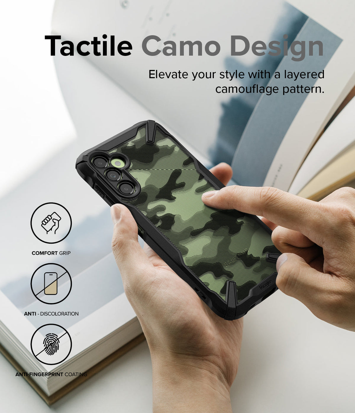 Galaxy A14 Case | Fusion-X - Hands holding a phone with a green camouflage case, featuring icons for grip and coating.