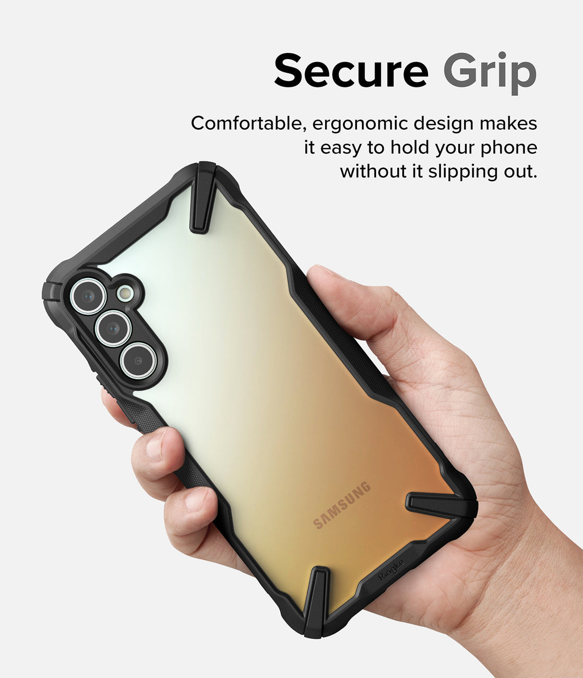 Galaxy A34 Case | Fusion-X - Hand holding a Samsung Galaxy A34 in a black protective case with a gradient back panel.