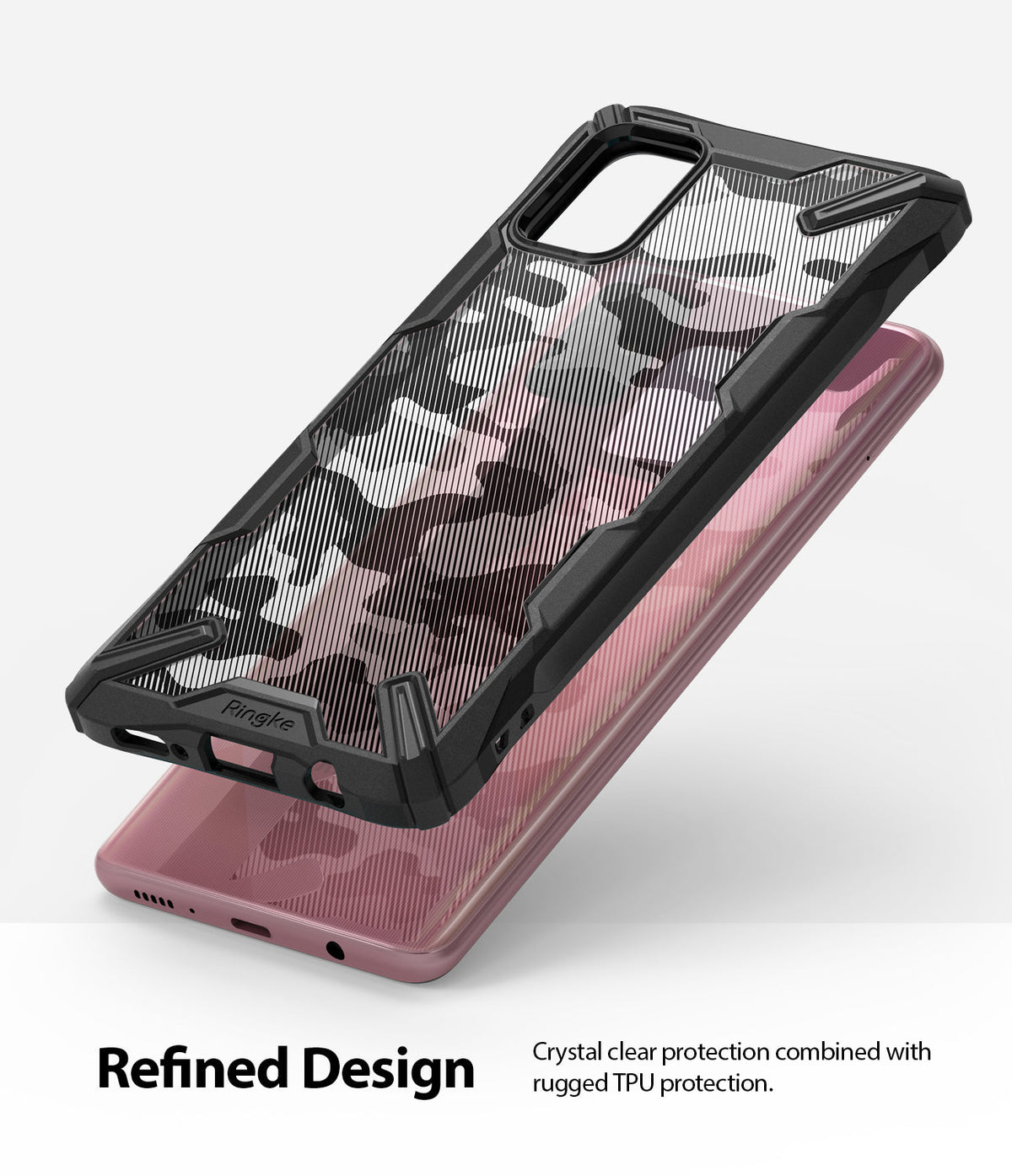 Galaxy A71 Case | Fusion-X - A black rugged phone case with a camo back hovering over a pink smartphone.