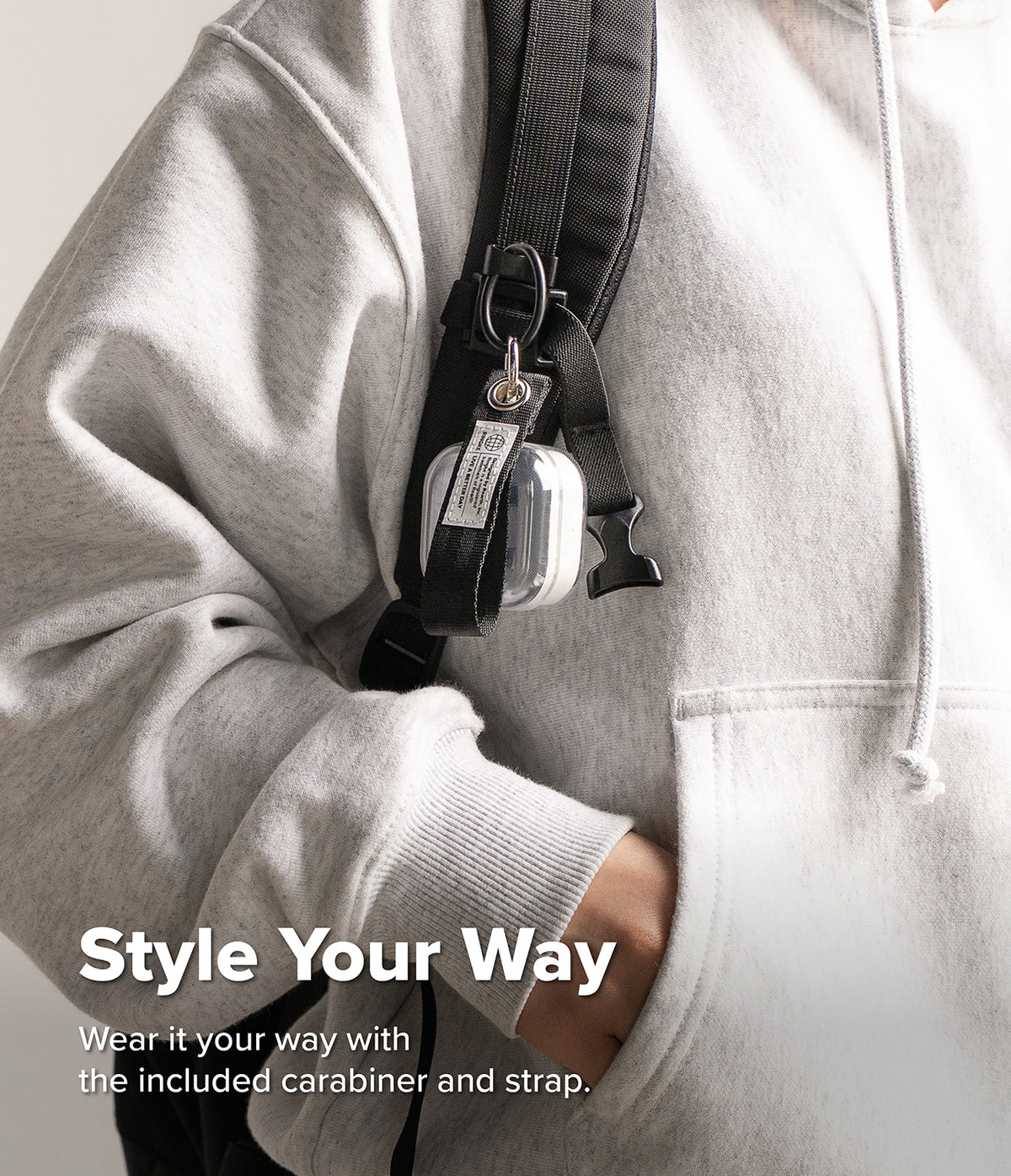 Galaxy Buds 4 Pro / 4 Case | Air - Clear earbud case with a black strap and carabiner attached to a backpack strap.