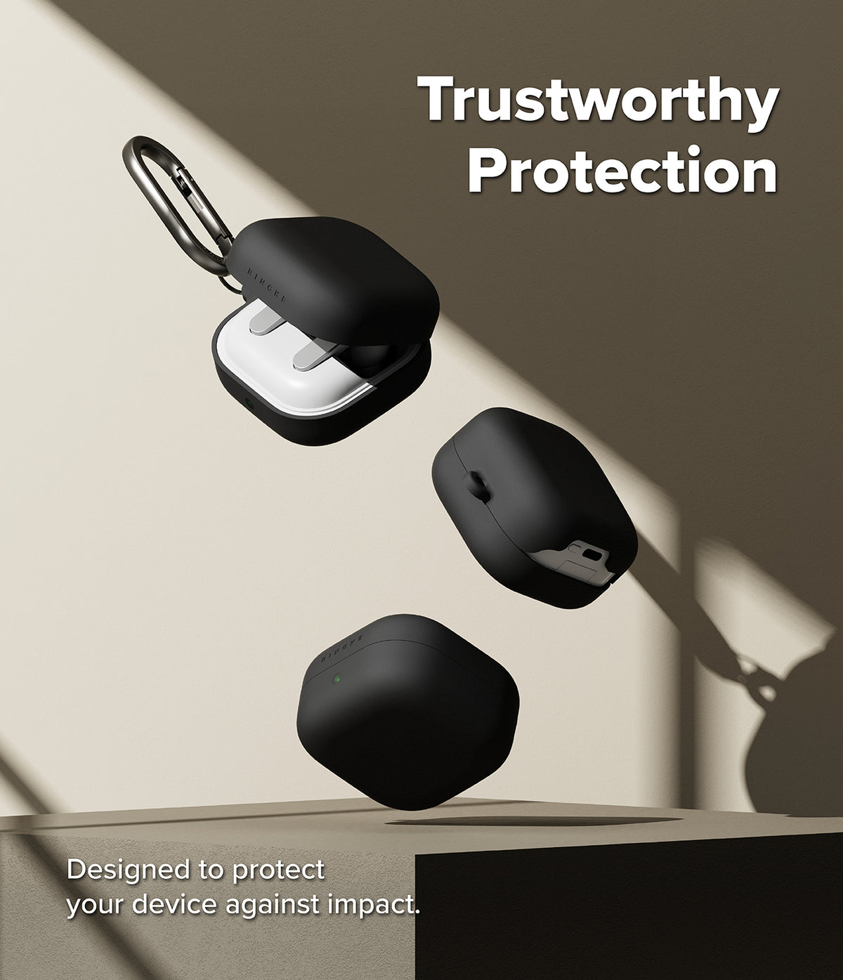 Samsung Galaxy Buds On / 4 Pro / 4 Case | Silicone - Three black silicone cases for Galaxy Buds floating above a platform.