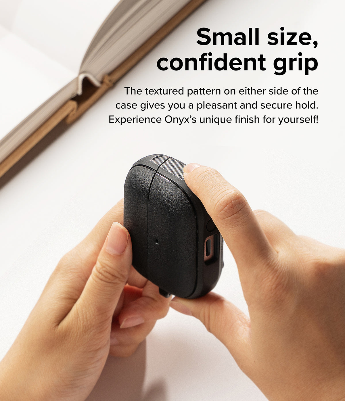 Galaxy Buds 3 Pro / 3 / 3 FE | Onyx Magnetic - Hands holding a textured black protective case for Galaxy Buds.