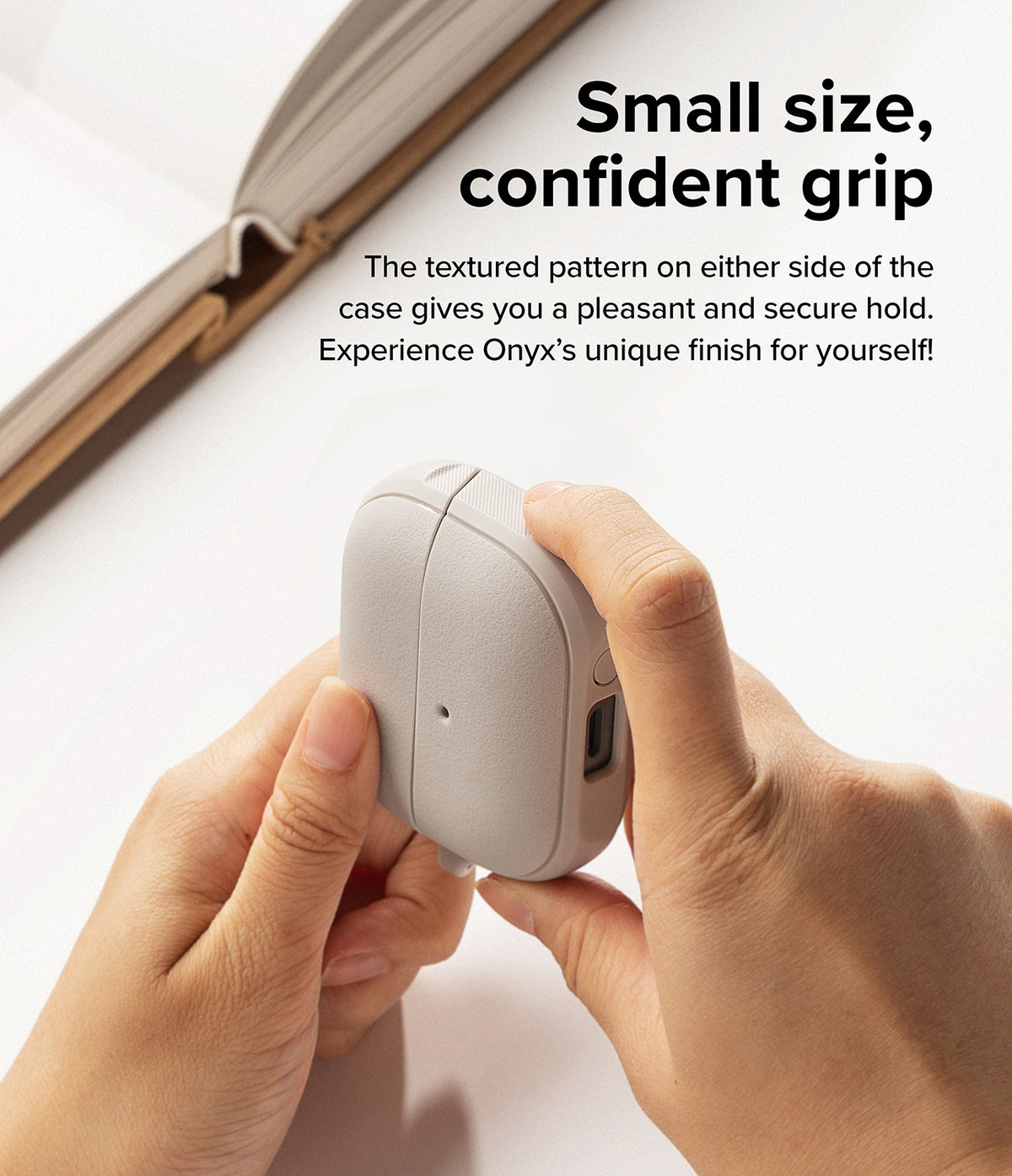 Galaxy Buds 3 Pro / 3 / 3 FE | Onyx Magnetic - Hands holding a textured, light gray earbud case with a secure grip.