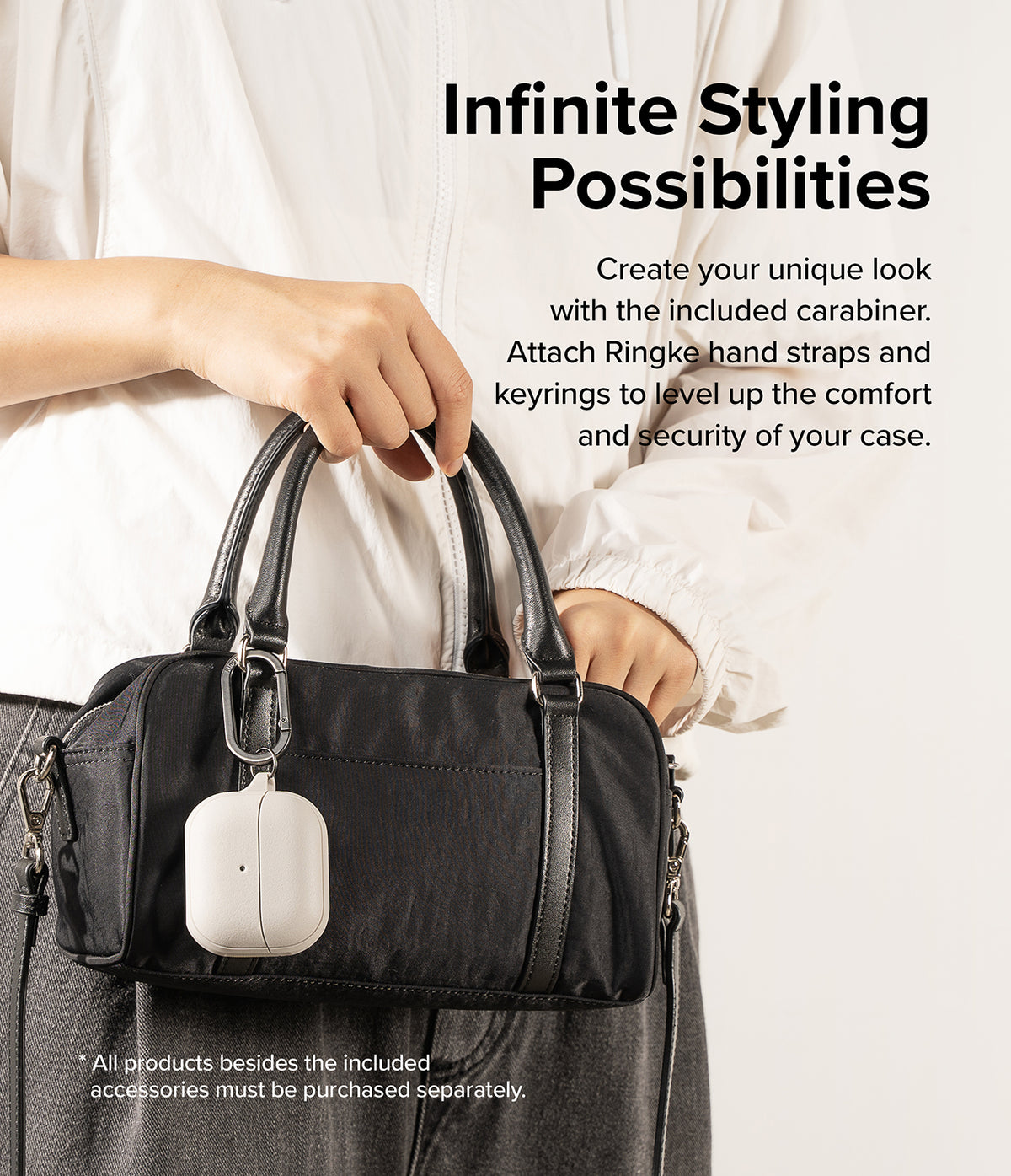 Galaxy Buds 3 Pro / 3 / 3 FE | Onyx Magnetic - A white earbud case attached to a black handbag via a metal carabiner.