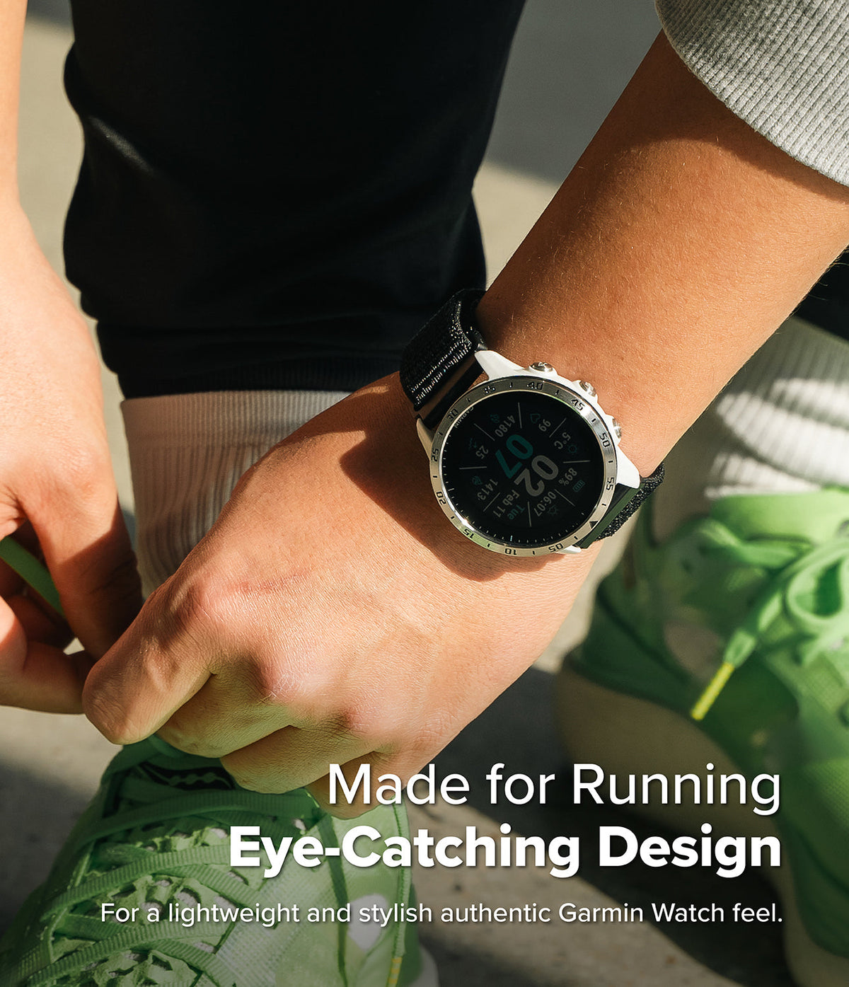 Forerunner 955 | Bezel Styling - A Garmin Forerunner 955 with a metallic bezel worn on a wrist while tying green running shoes.