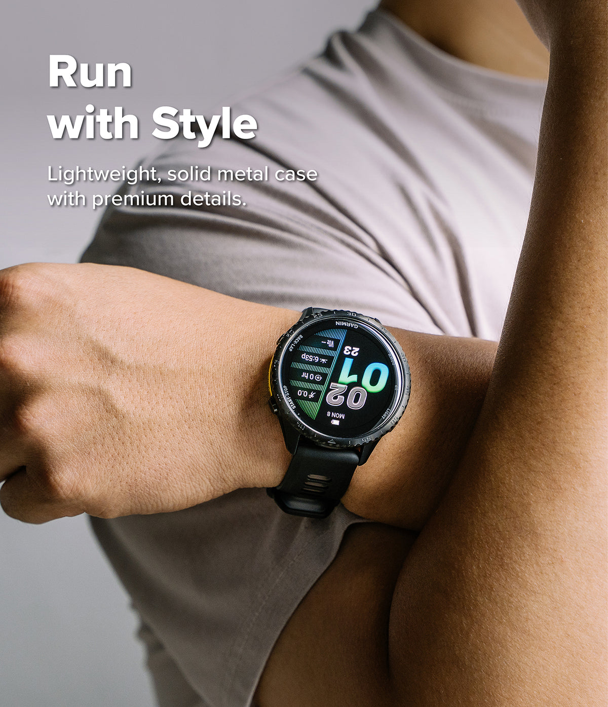 Forerunner 970 | Bezel Styling - A person wearing a Garmin Forerunner smartwatch with a textured metal bezel on their wrist.
