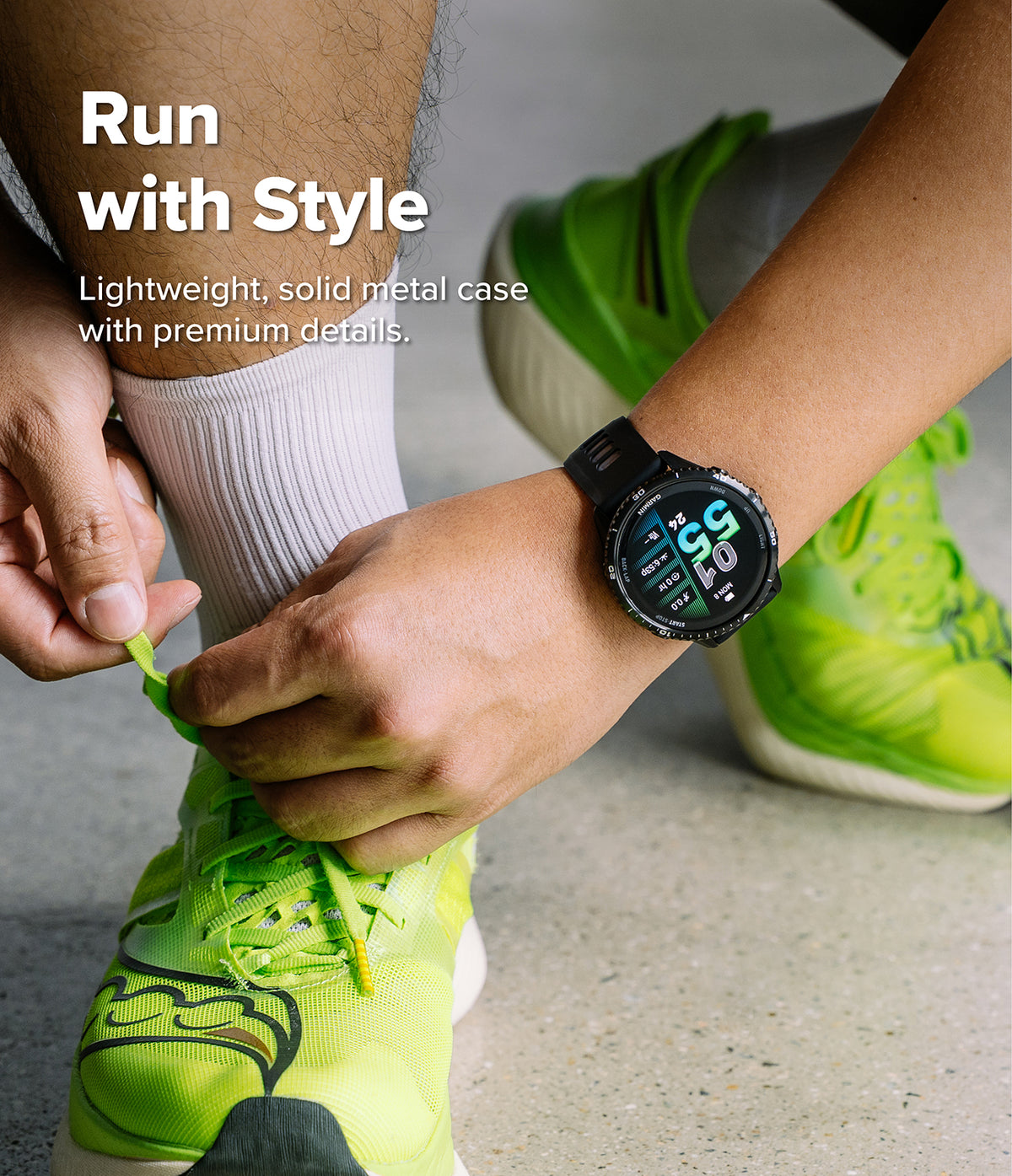 Forerunner 970 | Bezel Styling - Person tying neon green running shoes while wearing a black Garmin smartwatch on their wrist.