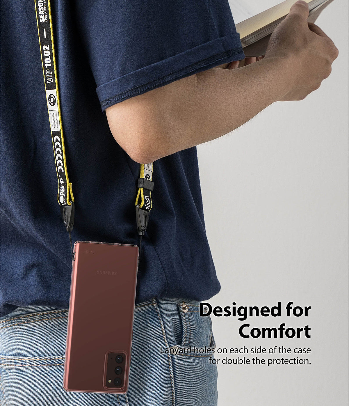 Galaxy Note 20 Case | Air - A person wearing a phone case with a yellow and black branded lanyard hanging from their shoulder.