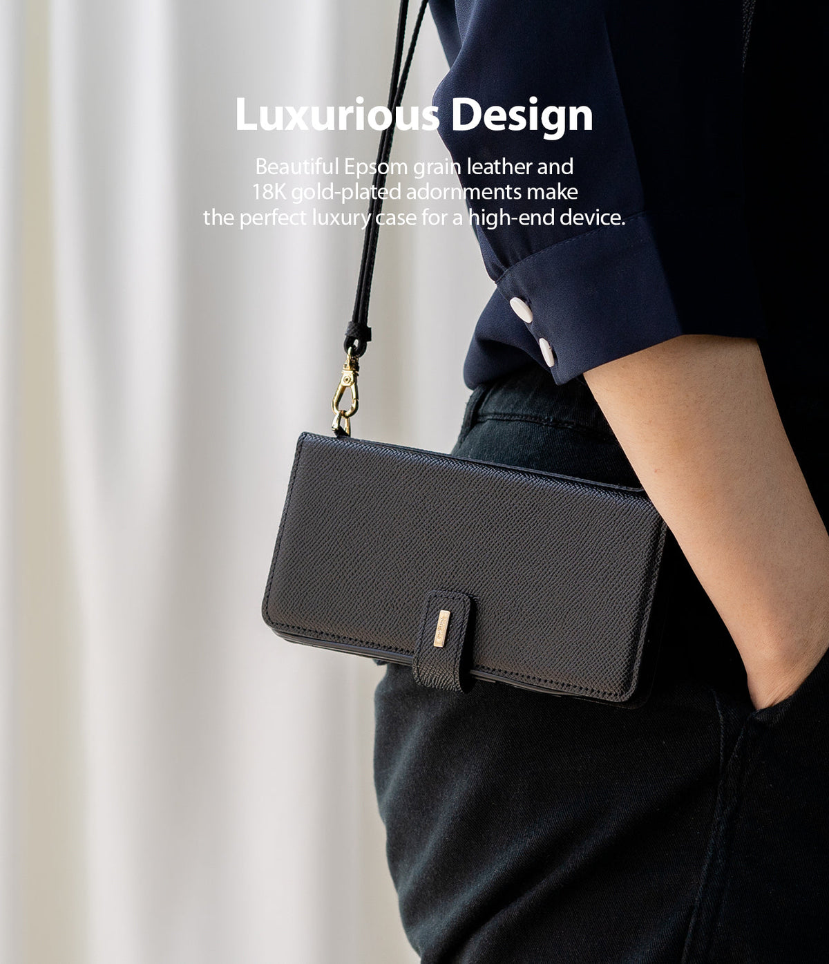 Galaxy Note 20 Case | Folio Signature Black - Person wearing a black leather folio phone case with gold hardware.