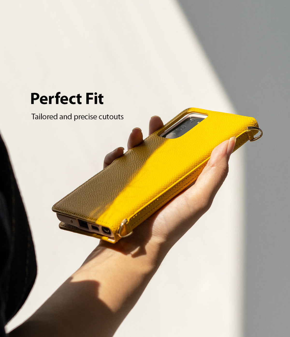 Galaxy Note 20 Case | Folio Signature Yellow - Hand holding a textured yellow folio case with precise port cutouts.