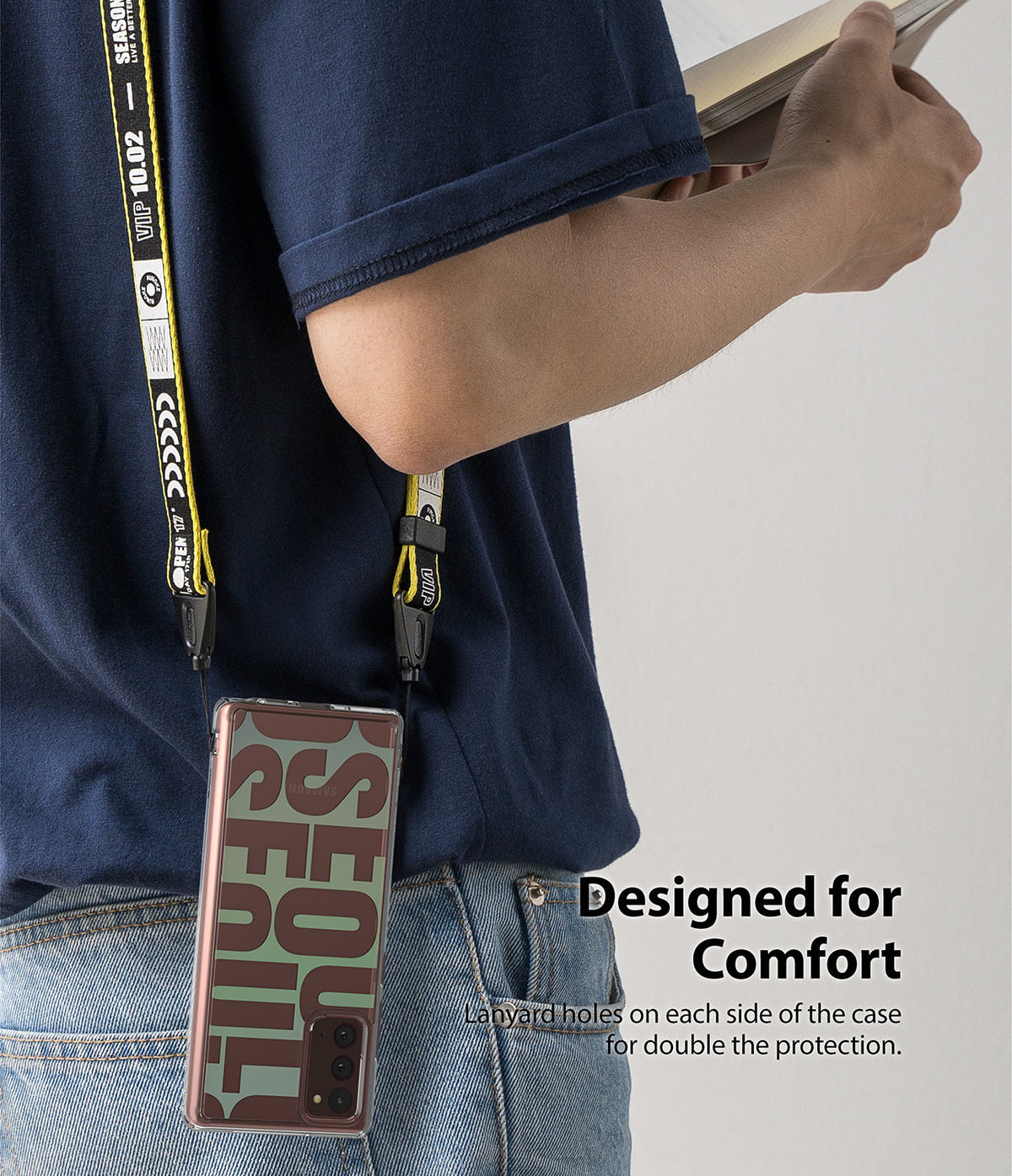 Galaxy Note 20 Case | Fusion Design - Person wearing a phone case with a yellow branded lanyard attached to side holes.
