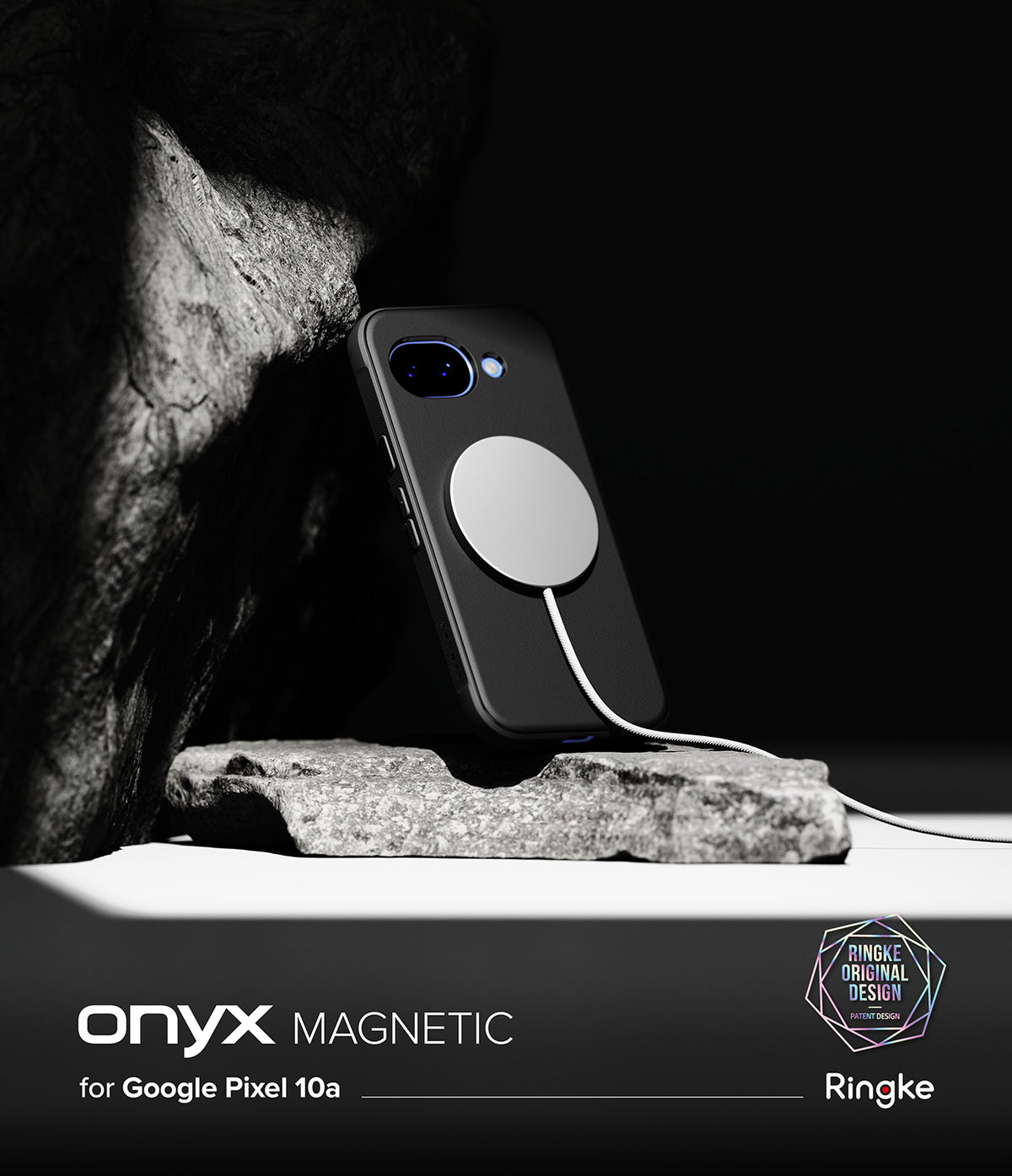 Google Pixel 10a Case | Onyx Magnetic - Black phone case with magnetic charger attached, resting on a stone against a dark backdrop.