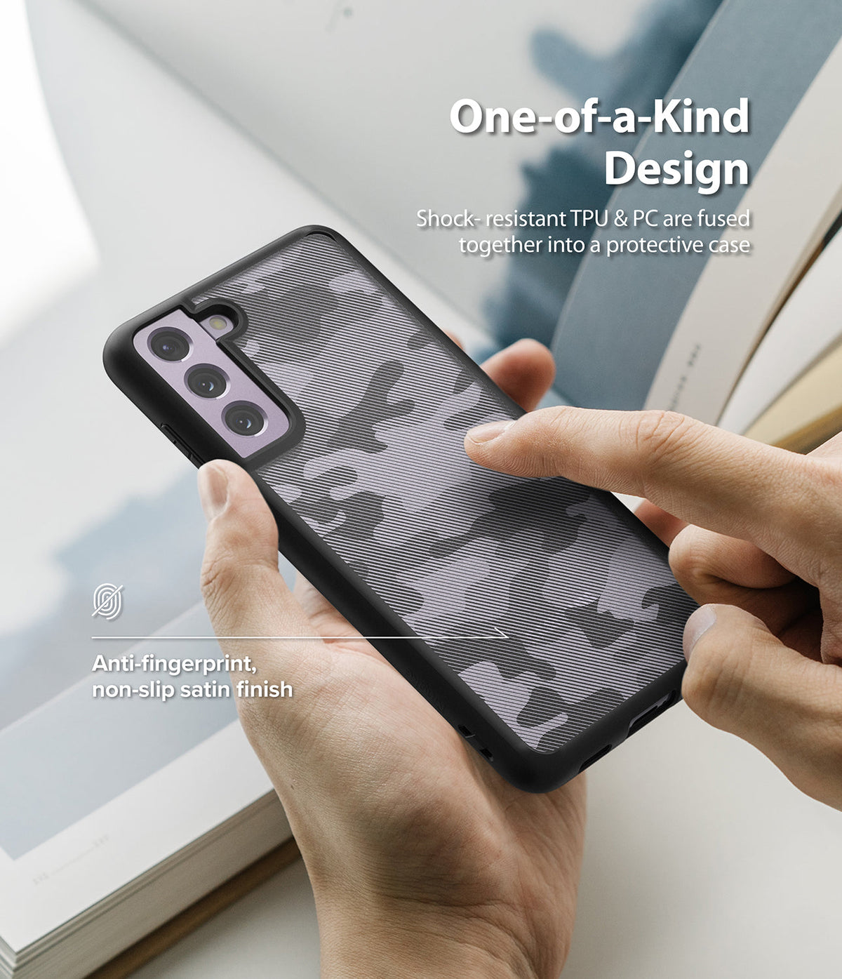 Galaxy S21 FE Case | Fusion - Hand holding a camo-patterned phone case with a satin finish and shock-resistant design.