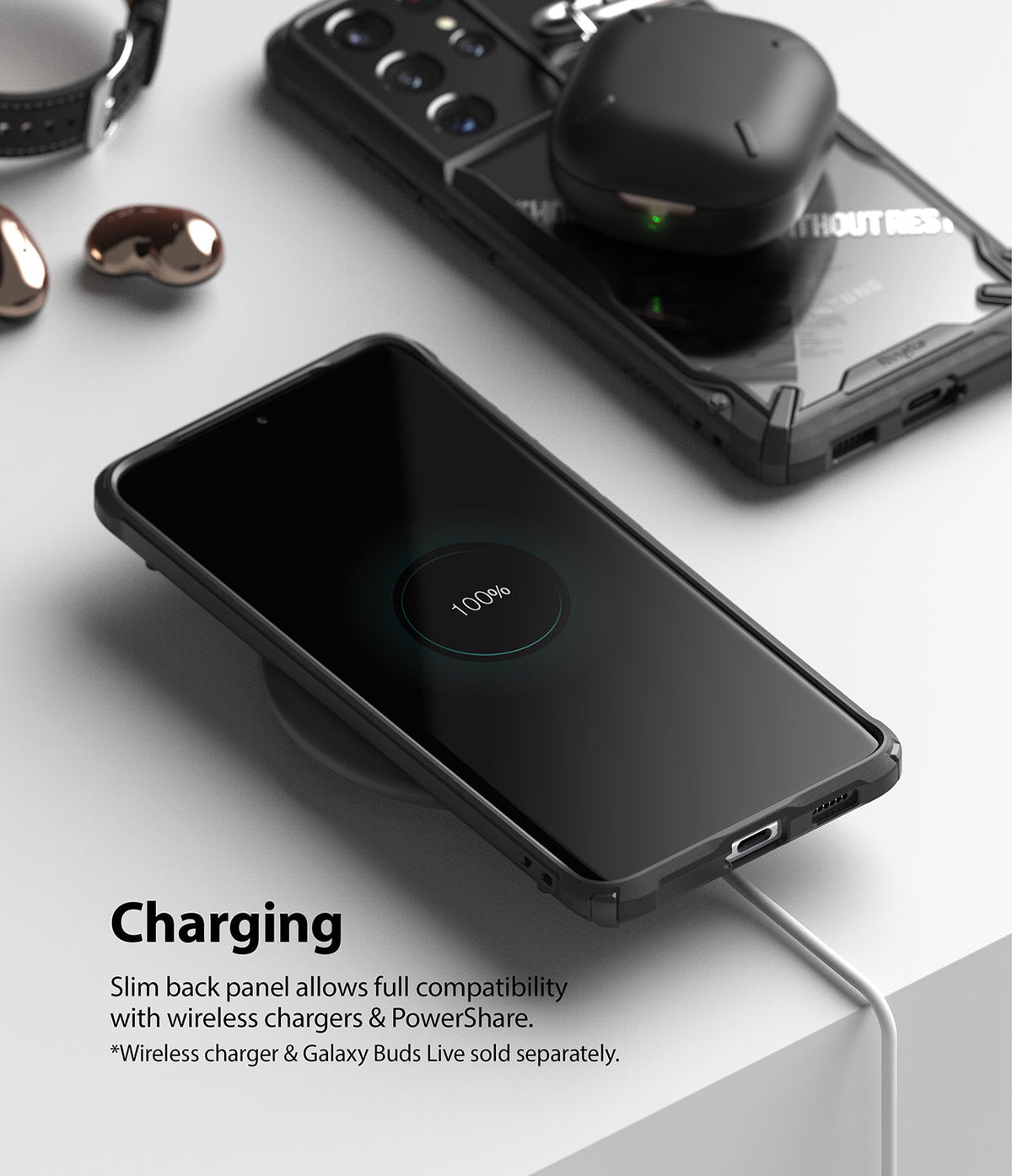 Galaxy S21 Ultra Case | Fusion-X Design - Phone in black case wirelessly charging with 100% battery icon displayed.