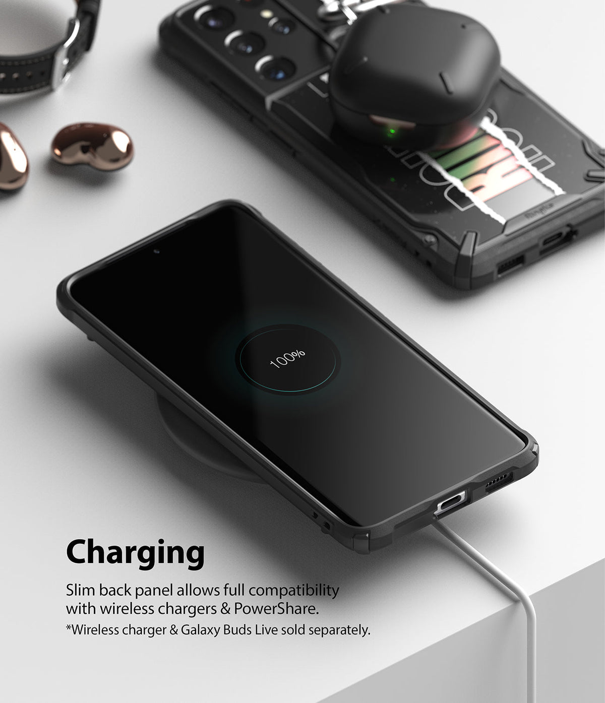 Galaxy S21 Ultra Case | Fusion-X Design - Phone in rugged case wirelessly charging with earbuds on a second device.