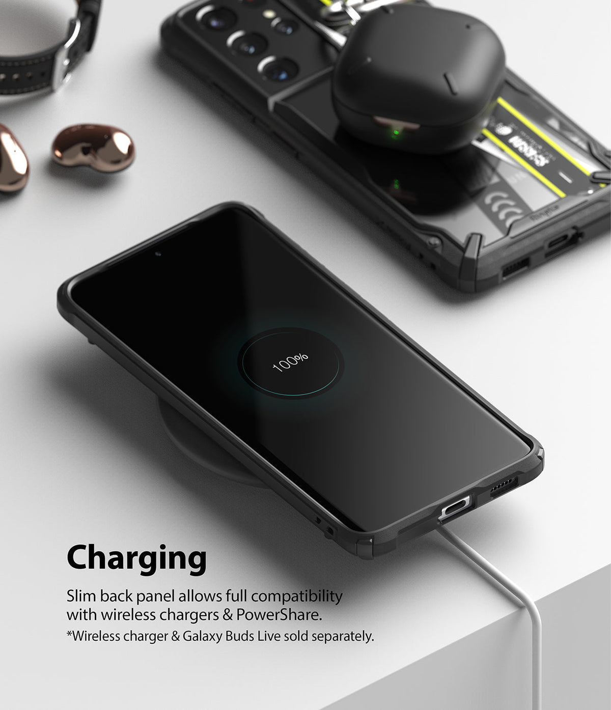 Galaxy S21 Ultra Case | Fusion-X Design - Phone in rugged case wirelessly charging with earbuds on a second device.