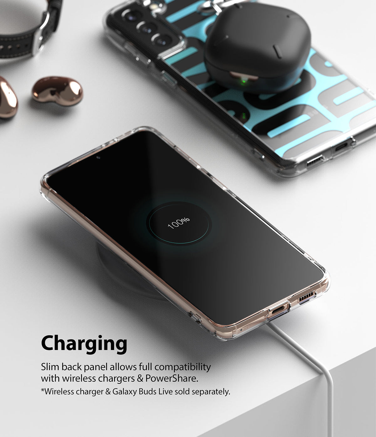 Galaxy S21 Case | Fusion Design - Galaxy S21 in a clear case wirelessly charging on a pad with earbuds nearby.