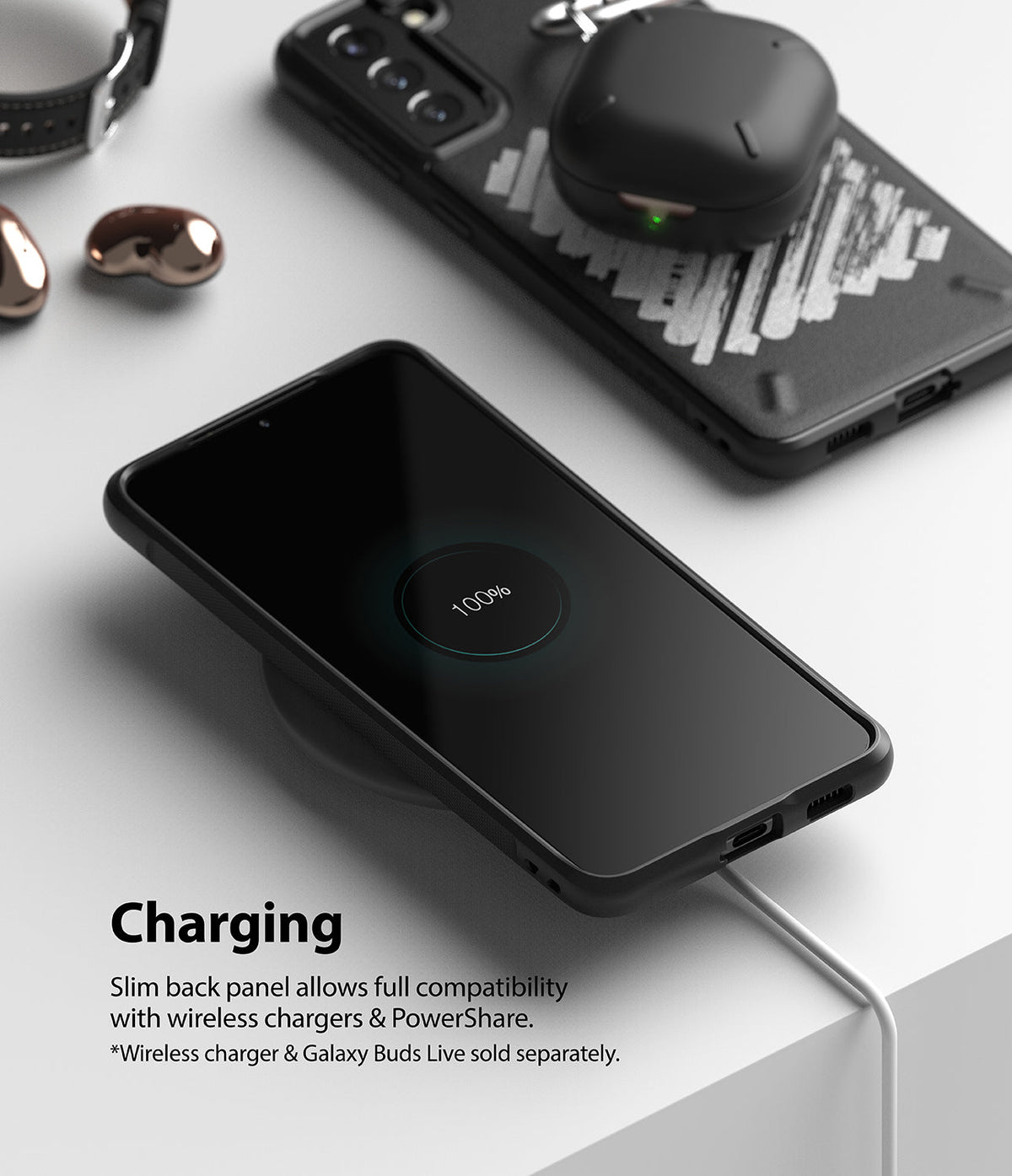 Galaxy S21 Case | Onyx Design - Galaxy S21 in a black case charging wirelessly, with a pair of Galaxy Buds Live nearby.
