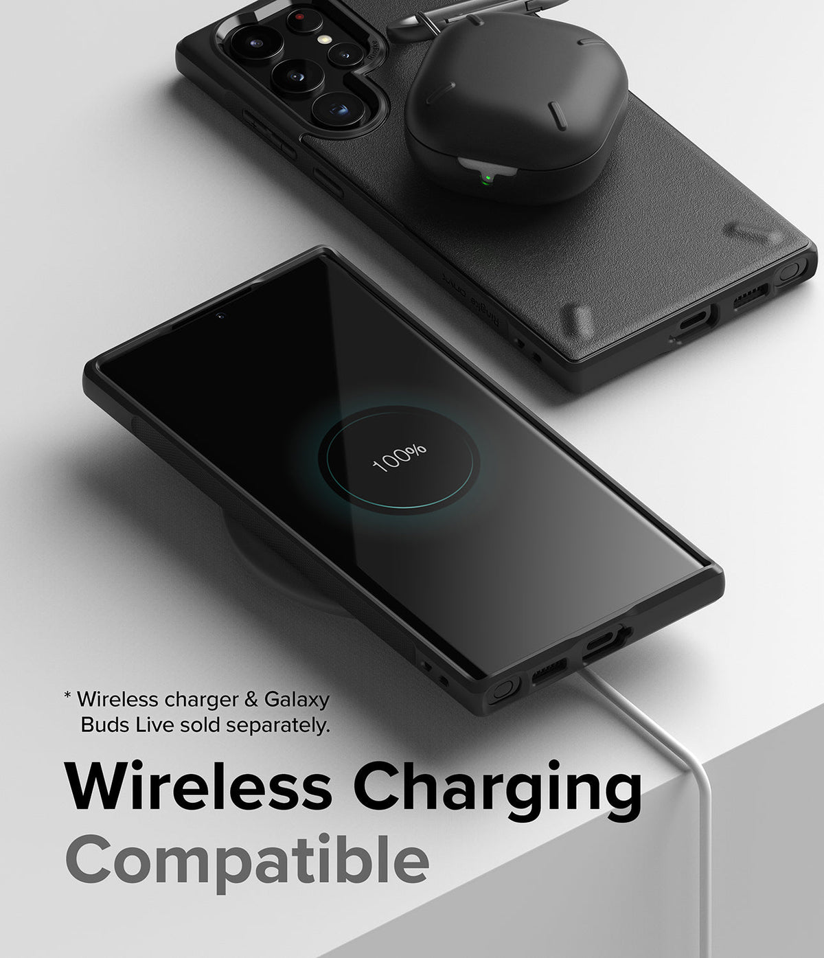 Galaxy S22 Ultra Case | Onyx - Black phone case on a wireless charger with earbuds resting on the back.
