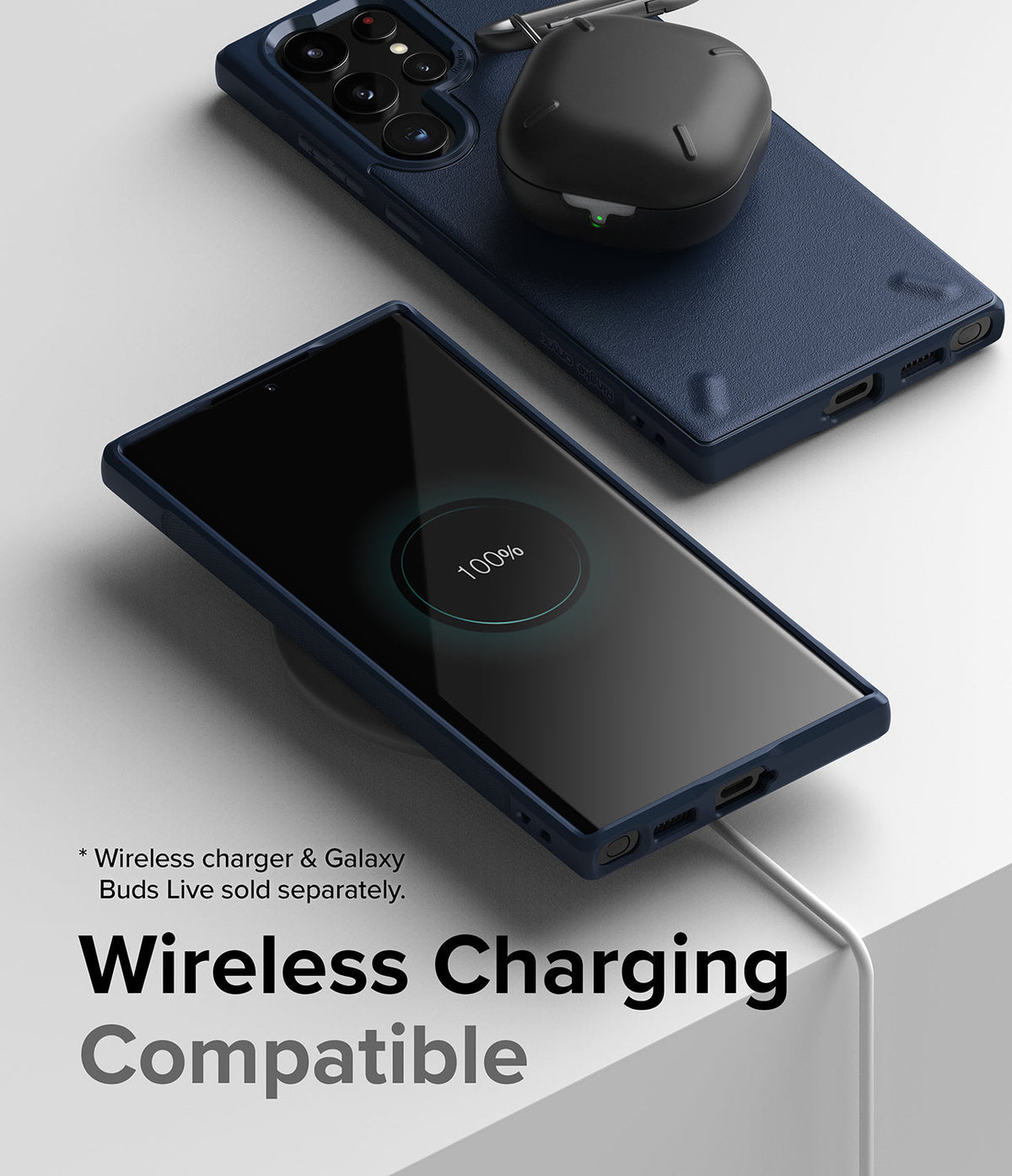 Galaxy S22 Ultra Case | Onyx - Navy blue phone case on a wireless charger with earbuds charging on the back.
