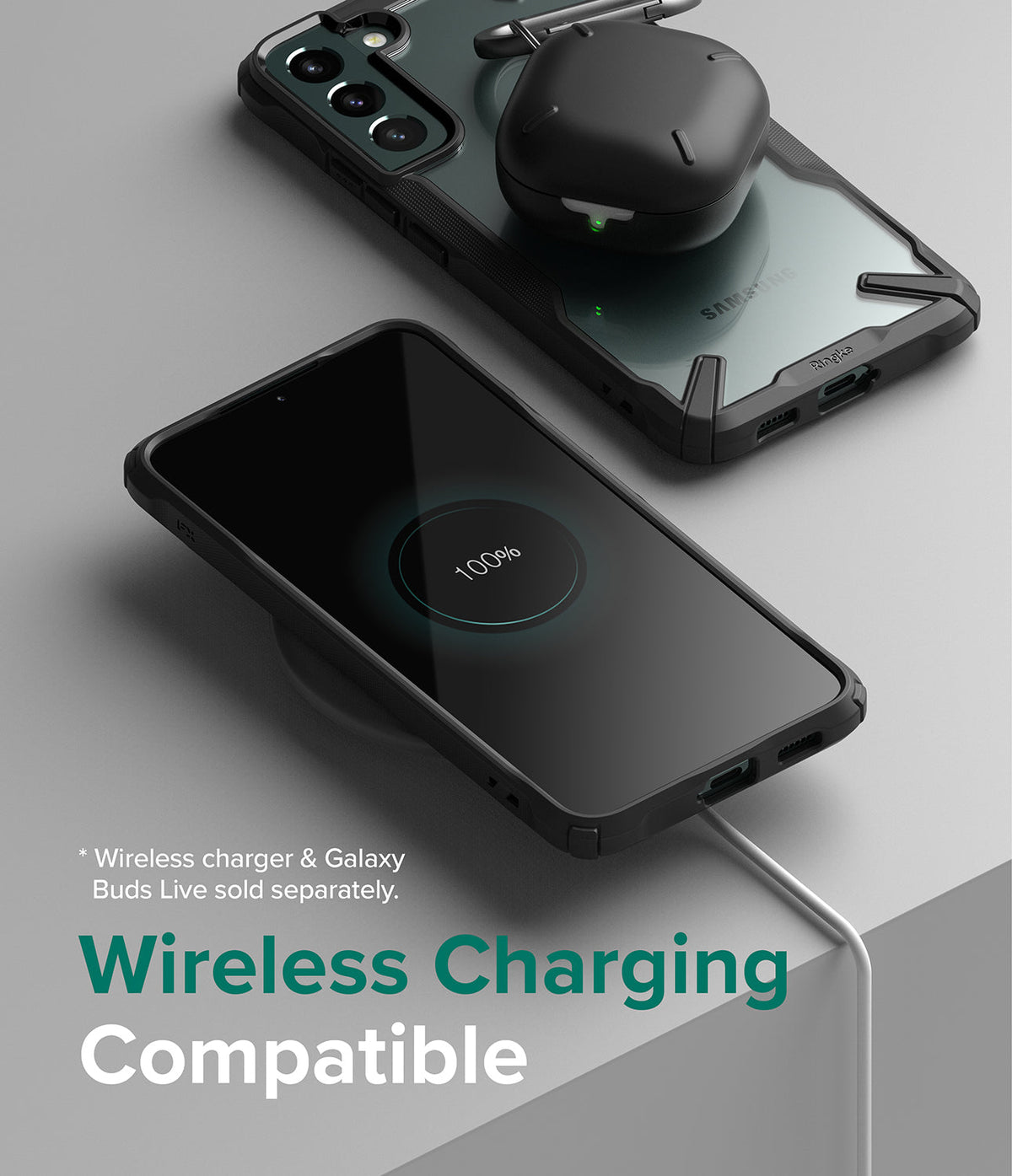 Galaxy S22 Plus Case Combo | Fusion-X Case + Screen Protector + Camera Protector - Galaxy S22 Plus Case Combo - Galaxy S22 Plus in a black Fusion-X case charging wirelessly with earbuds on top.