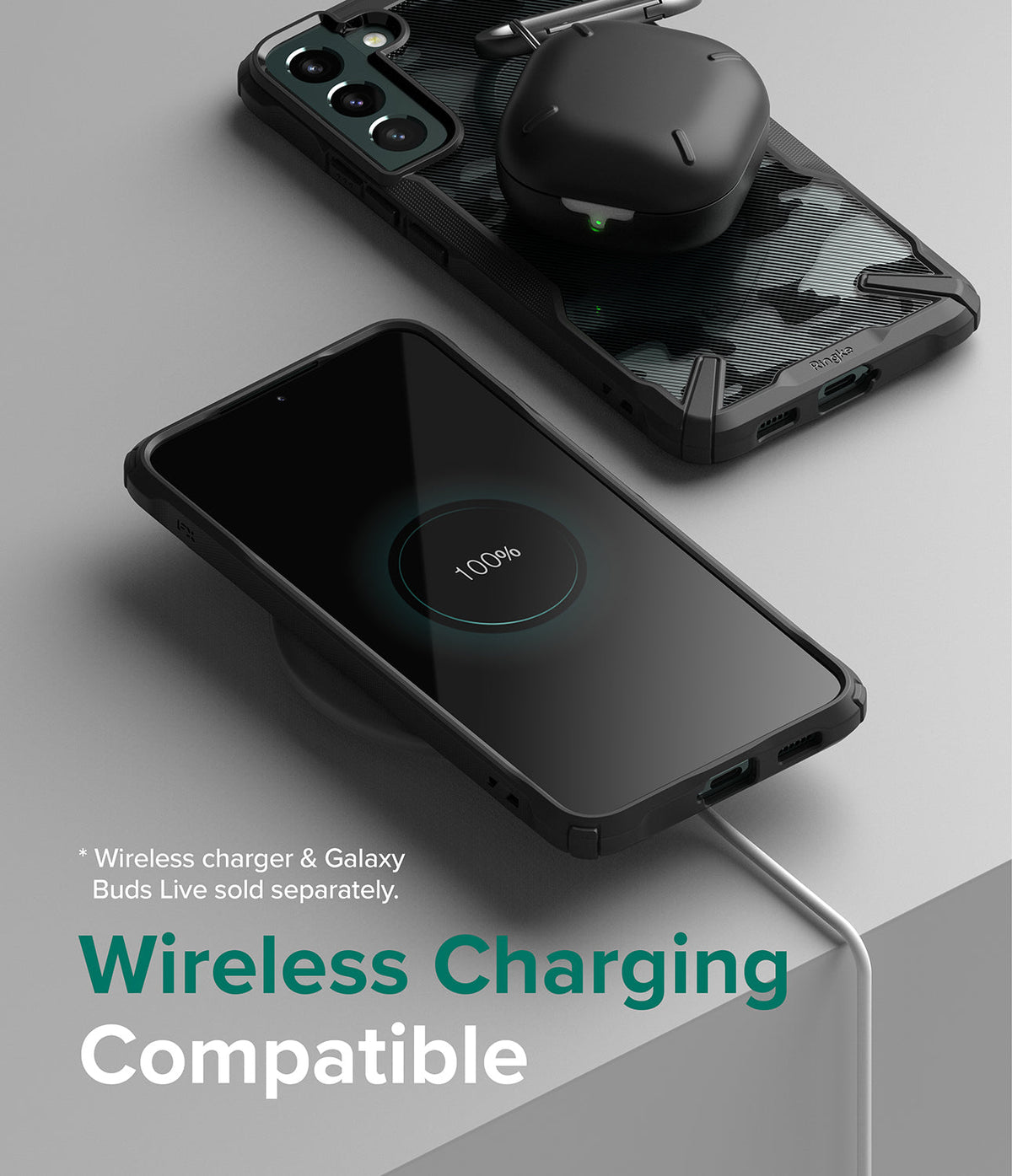 Galaxy S22 Plus Case Combo | Fusion-X Case + Screen Protector + Camera Protector - Galaxy S22 Plus Case Combo - Galaxy S22 Plus in a black Fusion-X case charging wirelessly with earbuds on top.