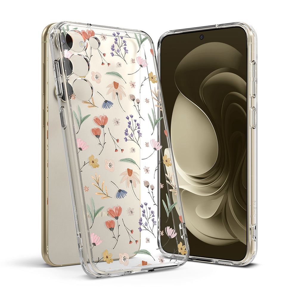Galaxy S23 Case | Fusion Design - Clear phone case with delicate floral pattern over a gold Galaxy S23 smartphone.