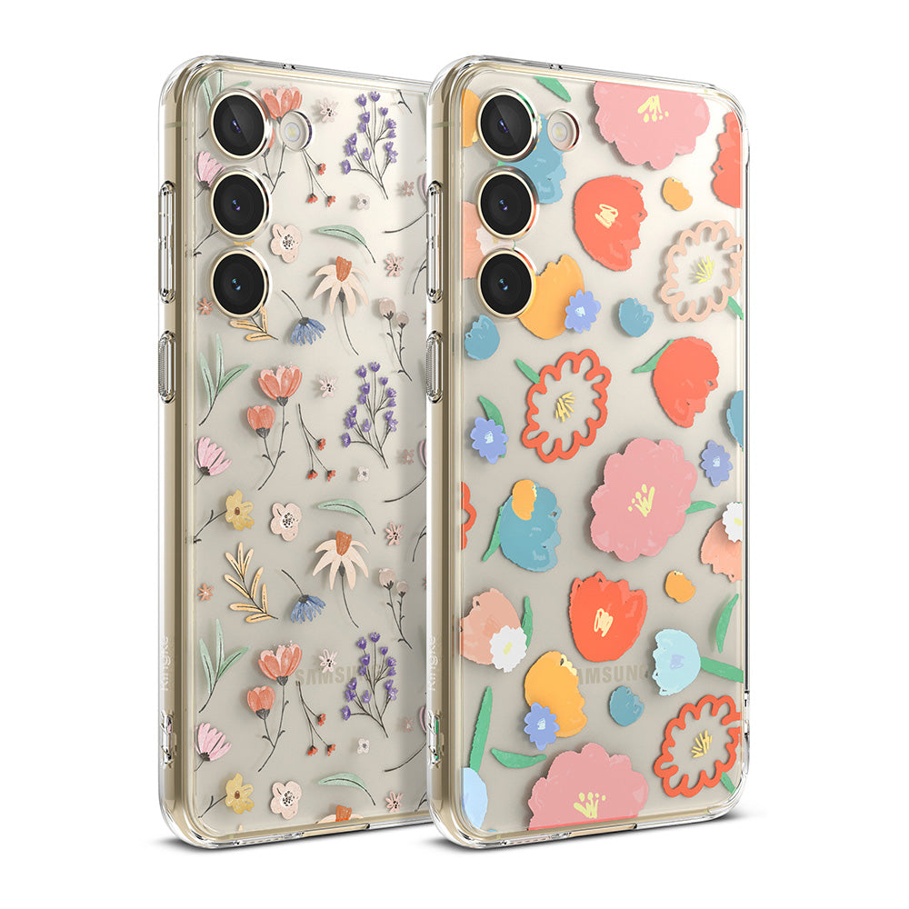 Galaxy S23 Plus Case | Fusion Design - Two clear phone cases with floral patterns, one with small wildflowers and one with large colorful blooms.