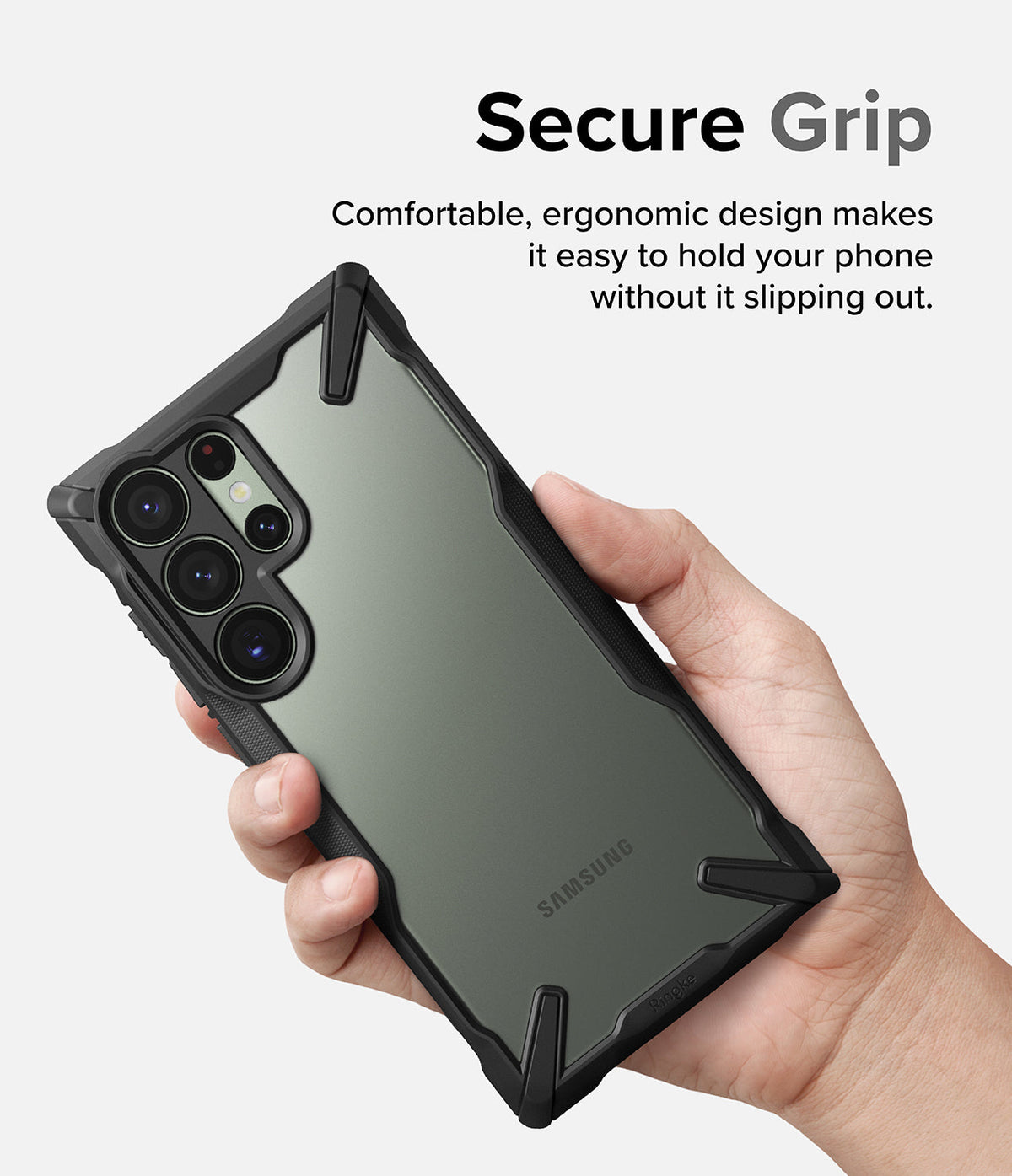 Galaxy S23 Ultra Case | Fusion-X - Hand holding a phone in a black, rugged, ergonomic protective case against a white background.