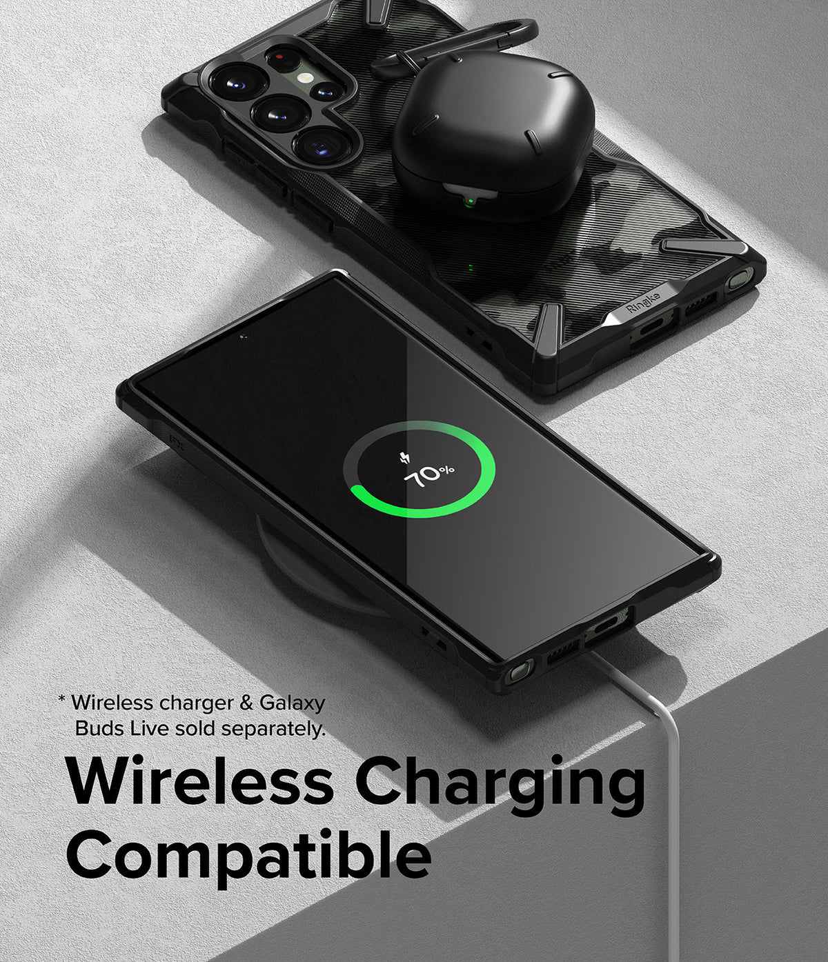 Galaxy S23 Ultra Case | Fusion-X - Phone and earbuds case on a wireless charger showing 70% battery charge.