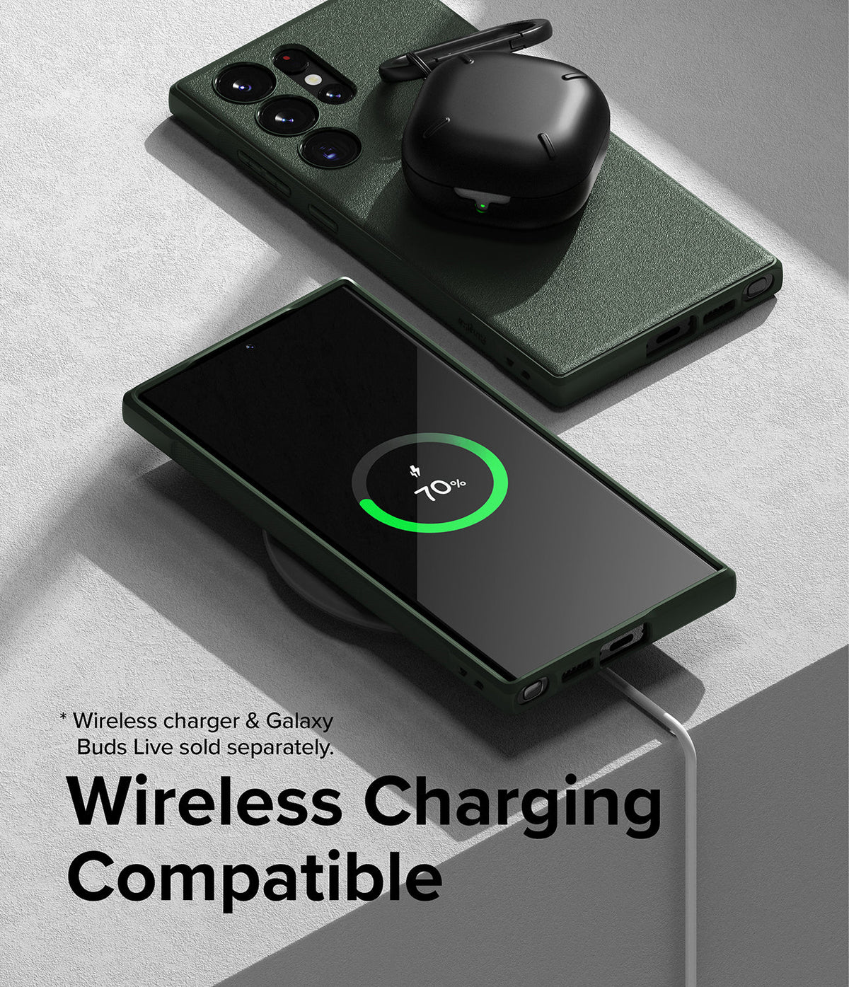 Galaxy S23 Ultra Case | Onyx - Green phone case on a wireless charger with charging screen and black earbuds case on top.