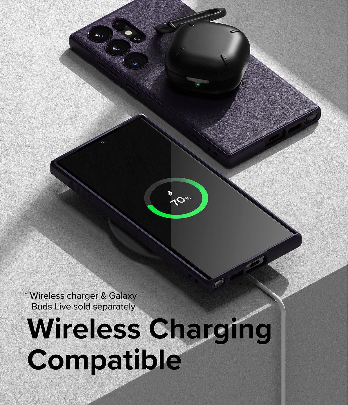 Galaxy S23 Ultra Case | Onyx - A textured black phone case on a wireless charger with charging Galaxy Buds on top.