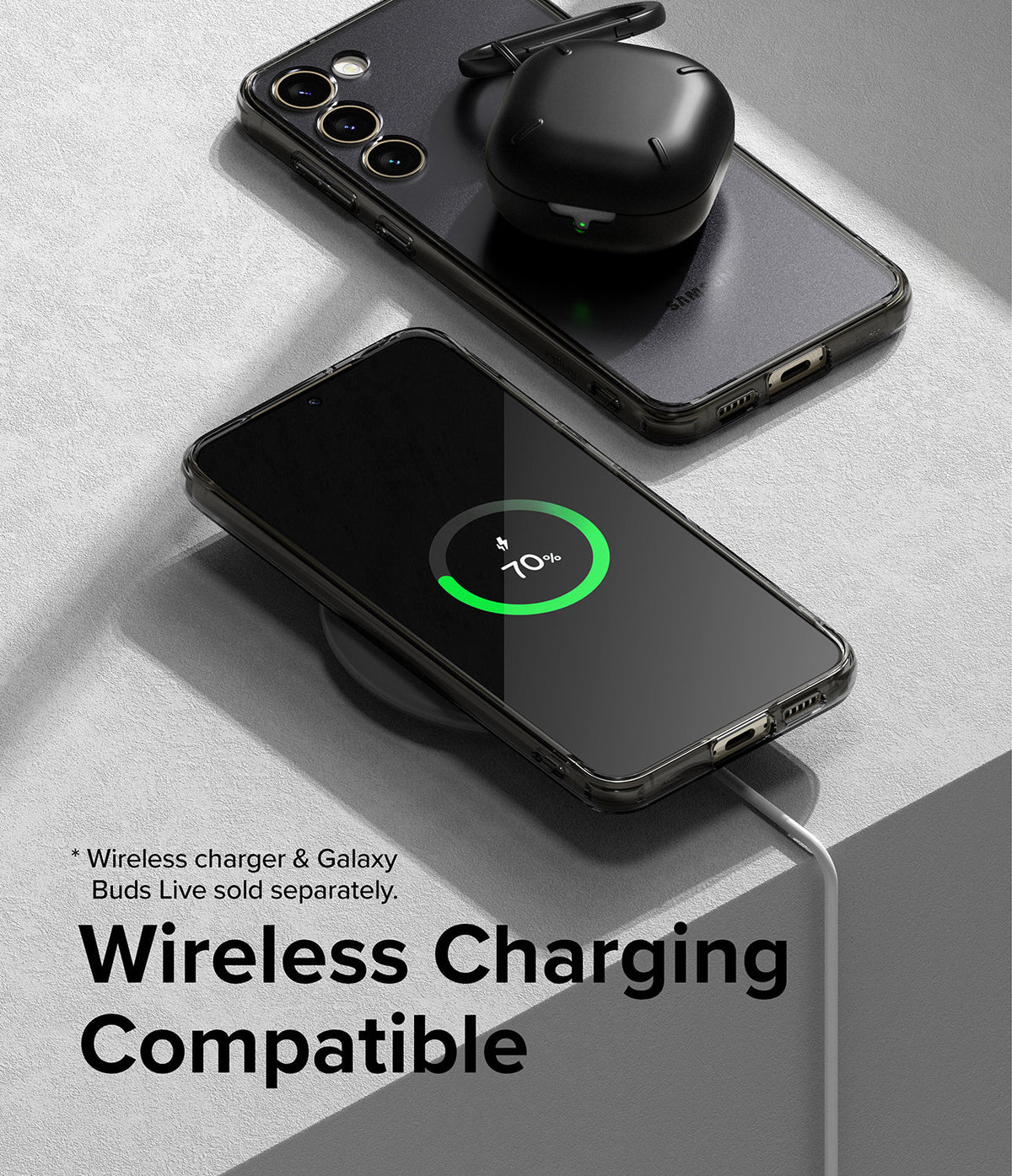 Galaxy S23 Case | Fusion - A Galaxy S23 in a clear case wirelessly charging, with a black earbud case resting on top.